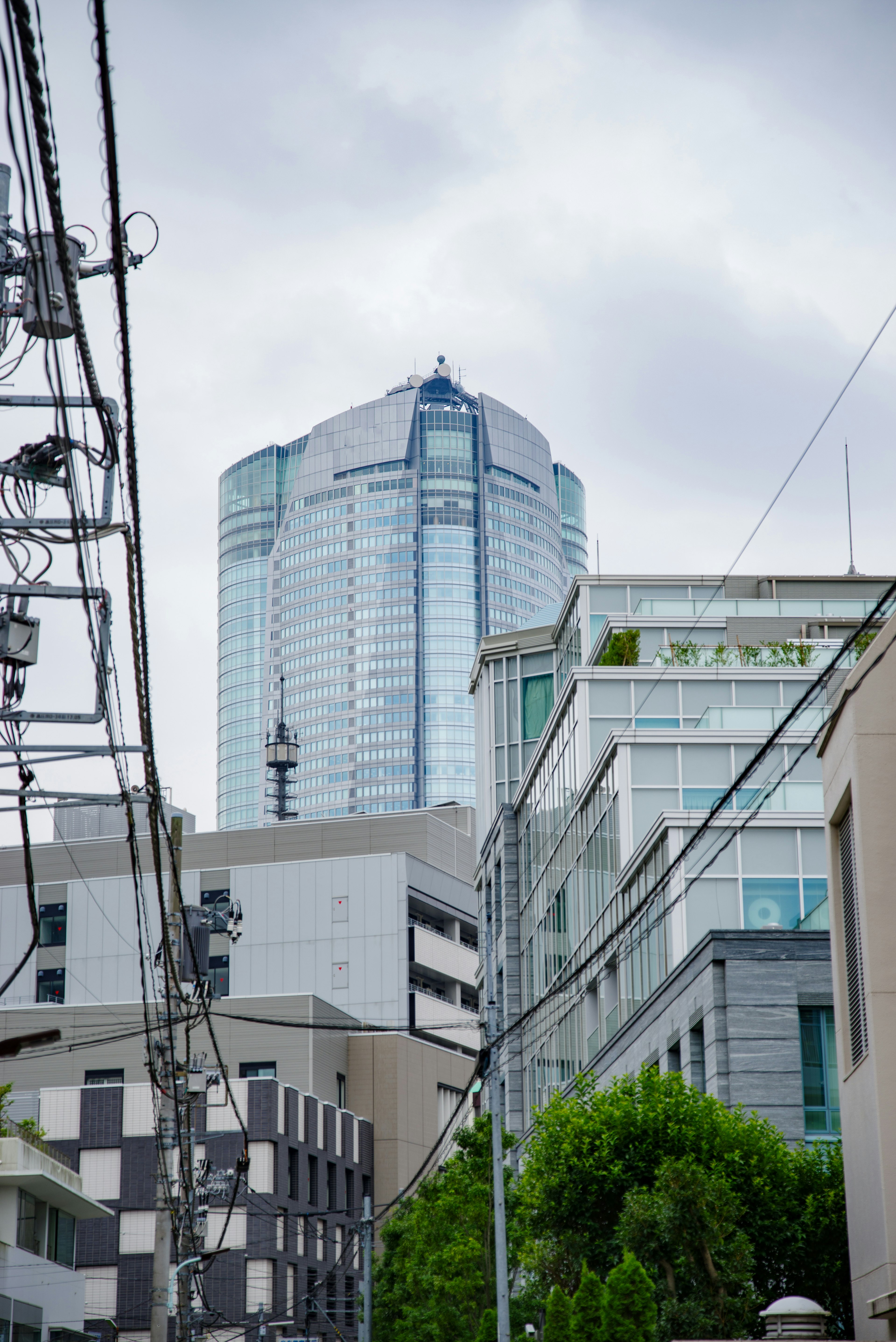 Urban landscape featuring a skyscraper and modern buildings