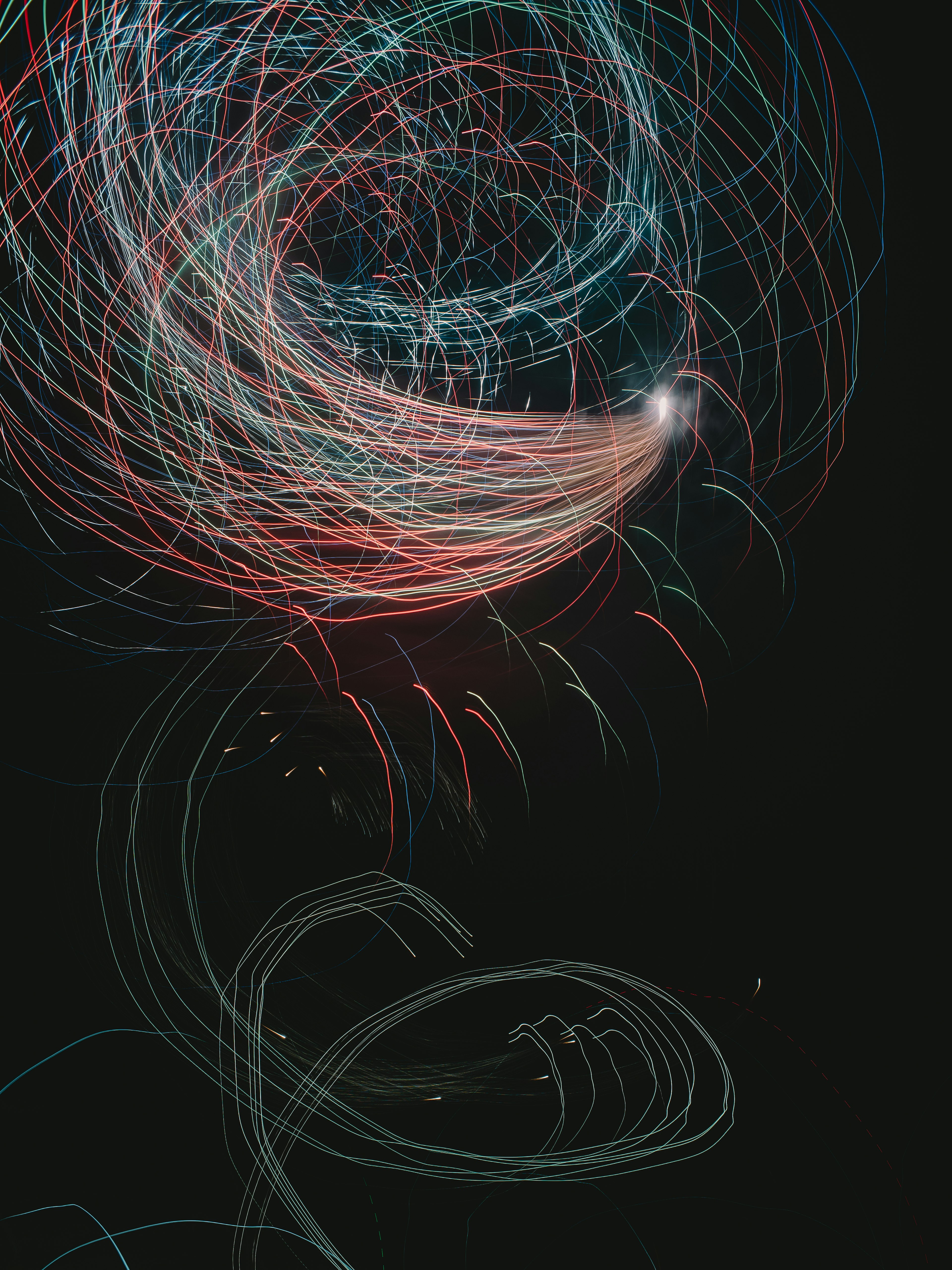 Abstract design featuring swirling colorful light trails