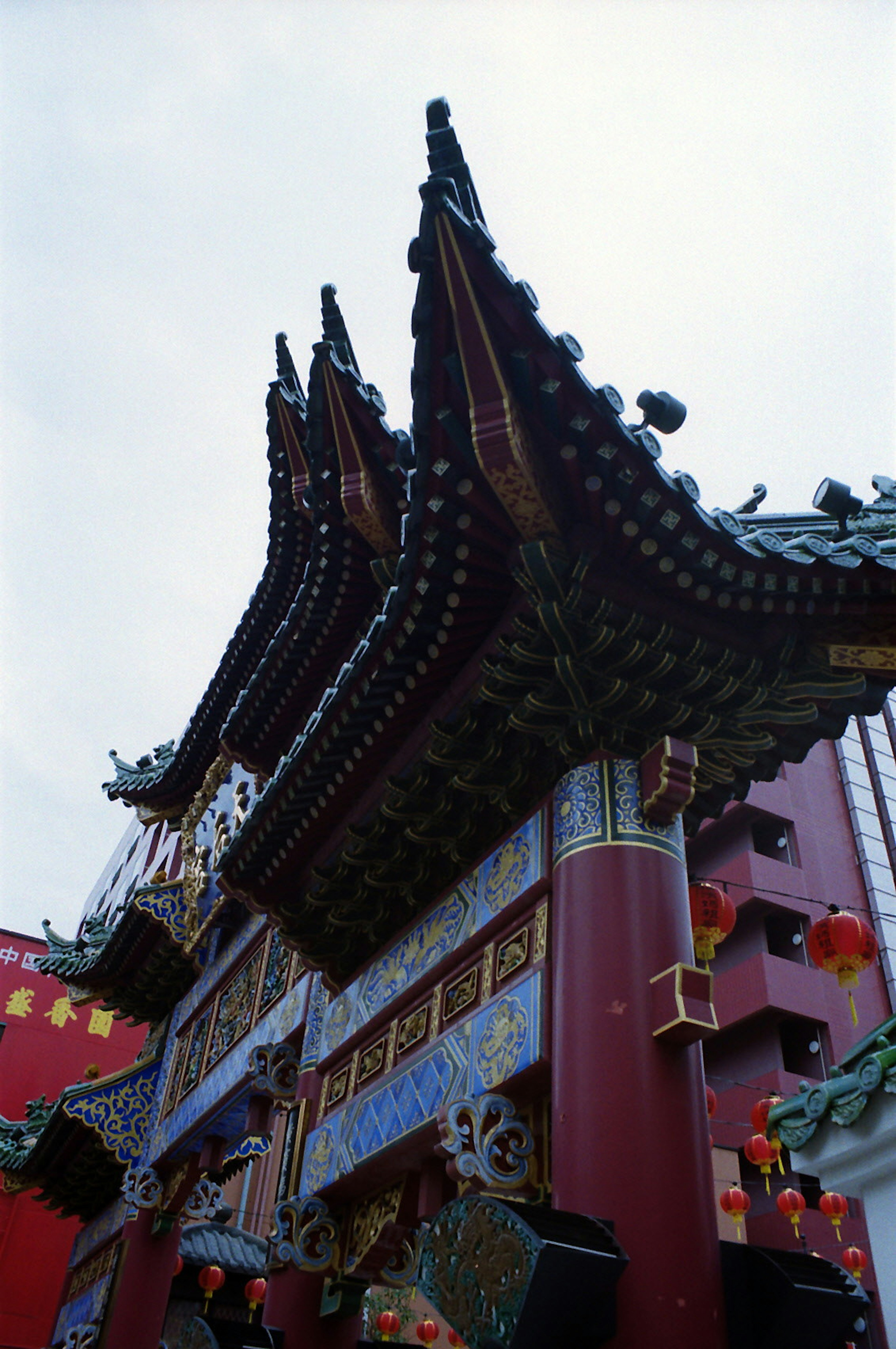 Detailed view of ornate Chinese architecture with vibrant rooflines