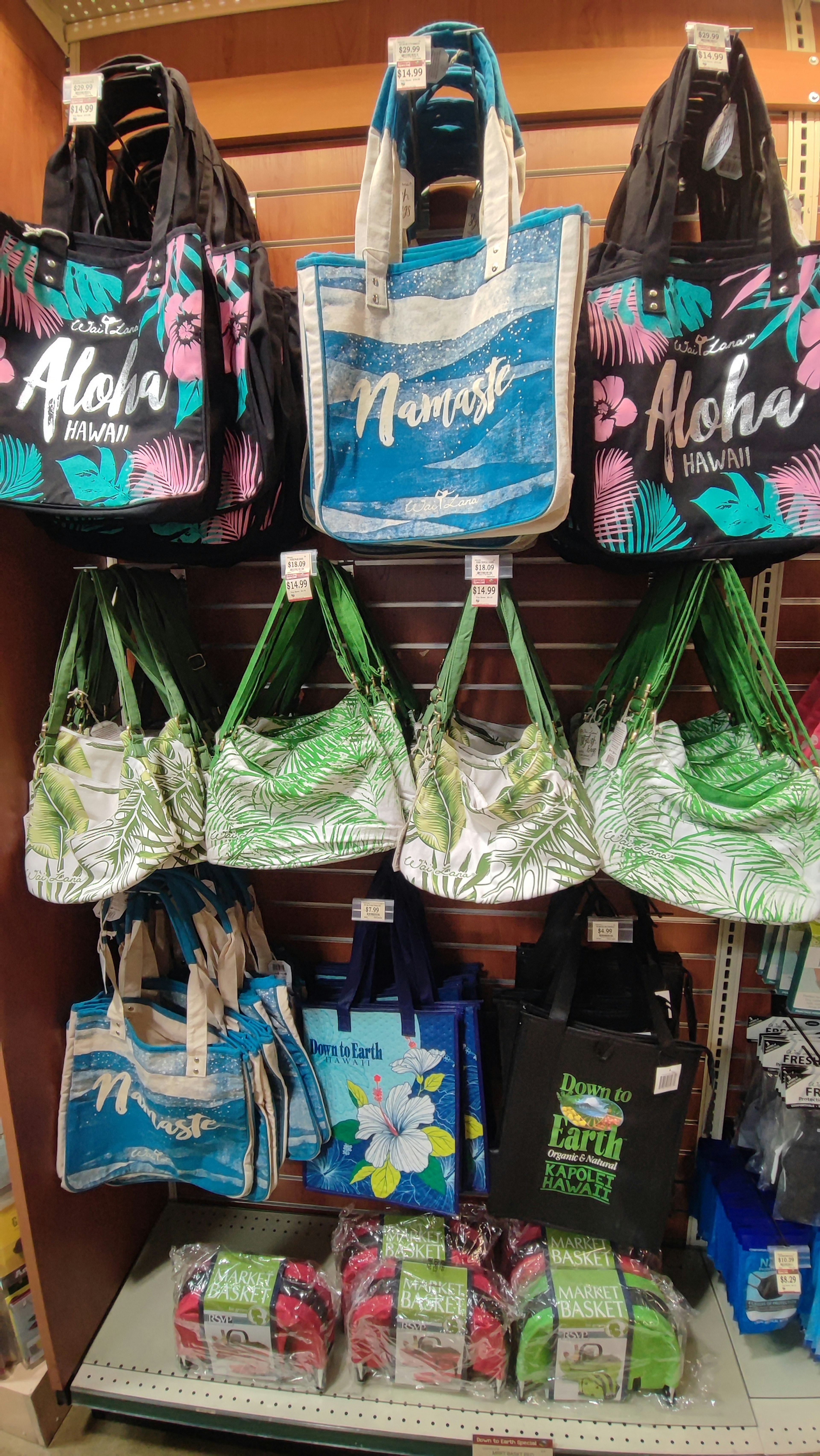 Colorful tote bags displayed on a shelf