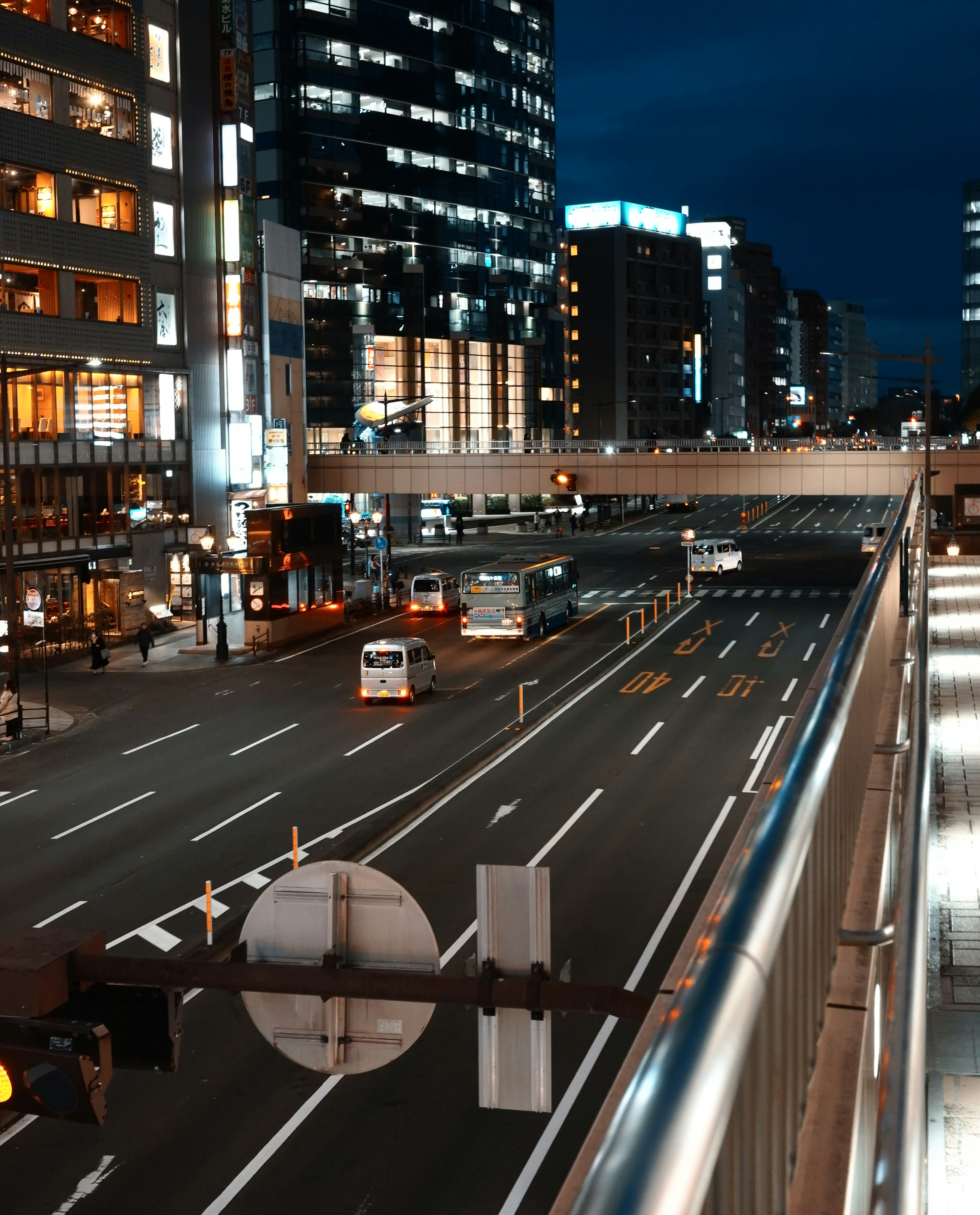 Night cityscape with visible traffic and buildings