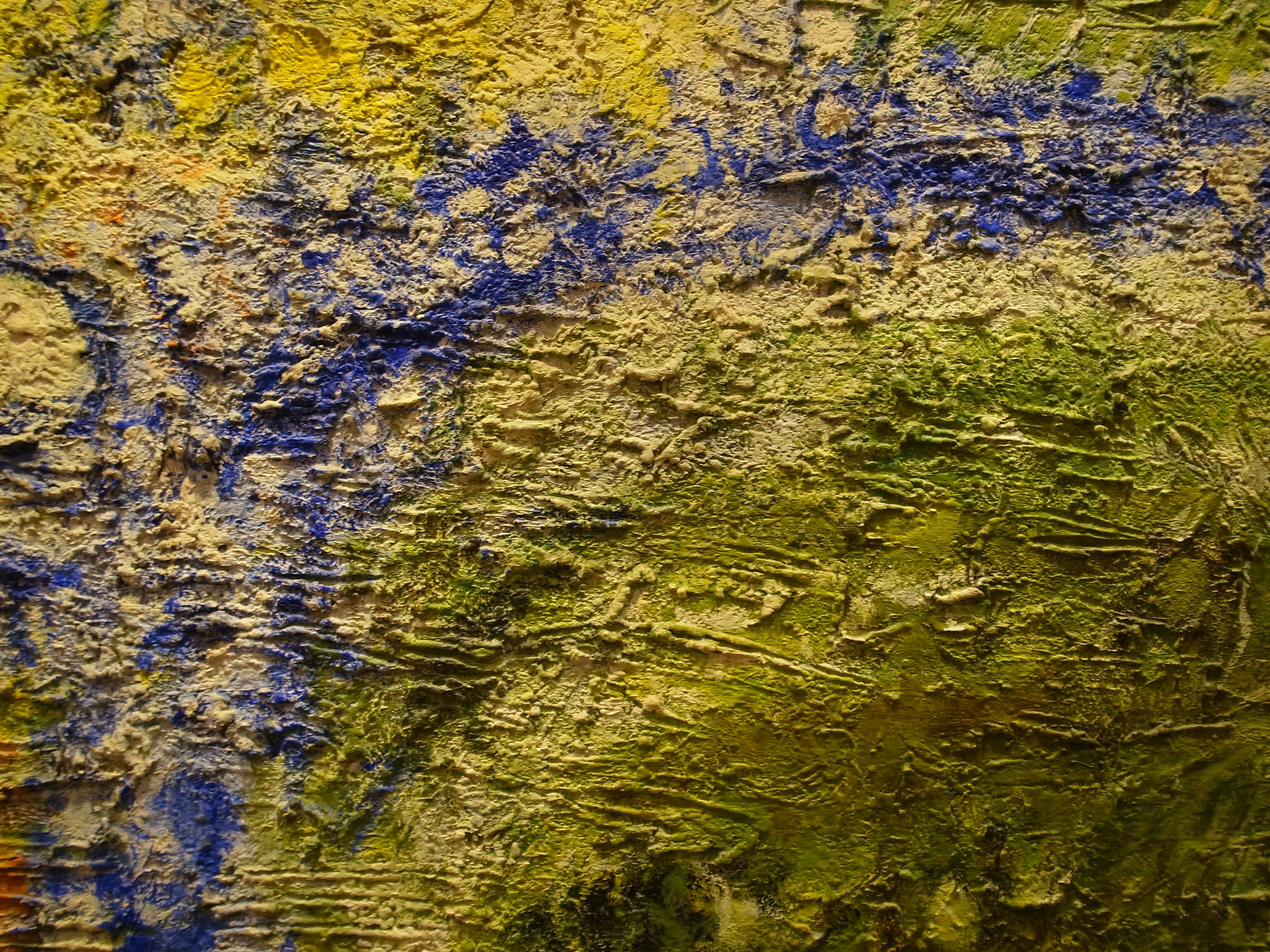 Abstract texture featuring vibrant yellow and blue hues