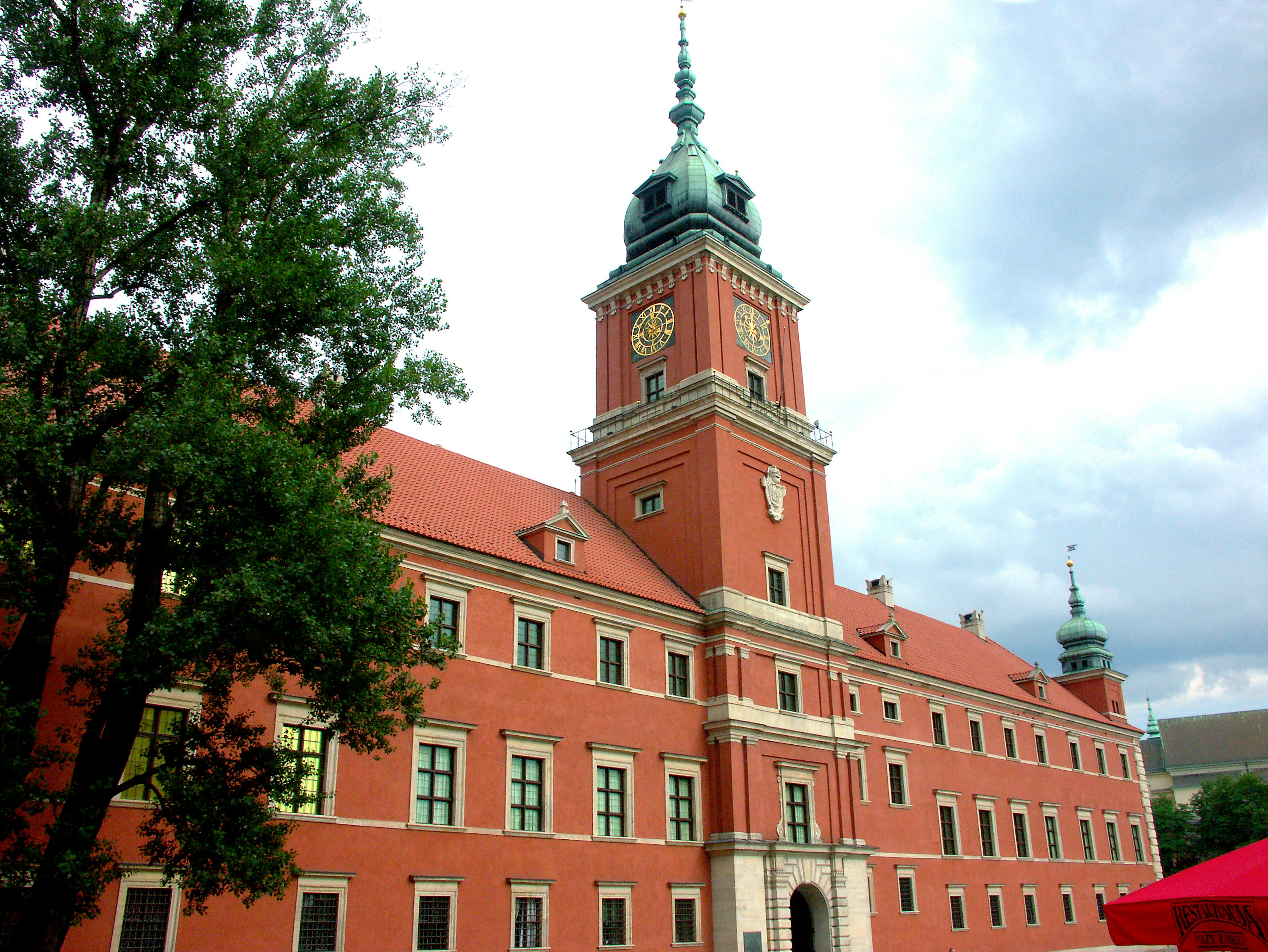 Historic palace with red brick building and clock tower