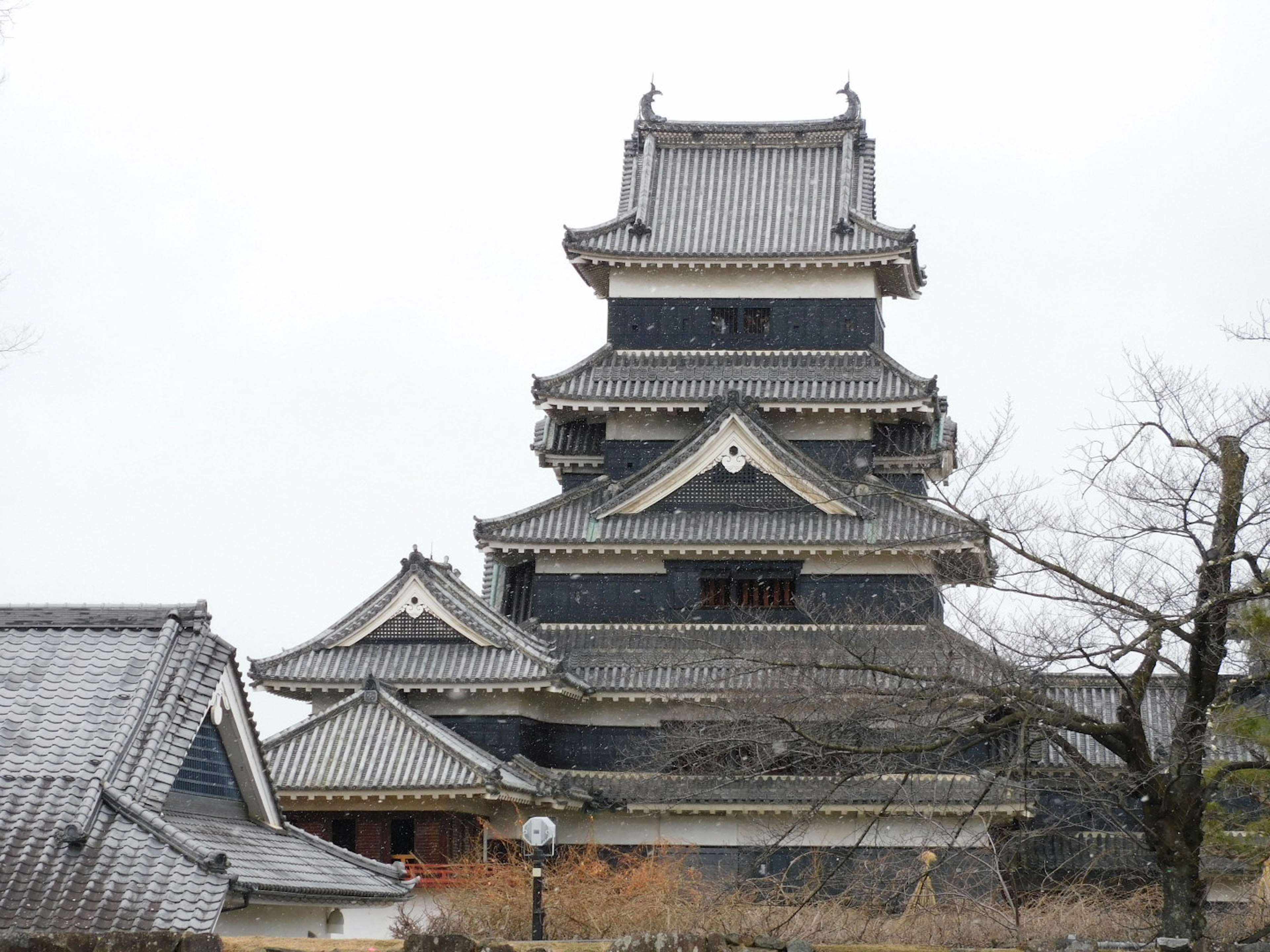 Beautiful exterior of Matsumoto Castle with distinctive roofs