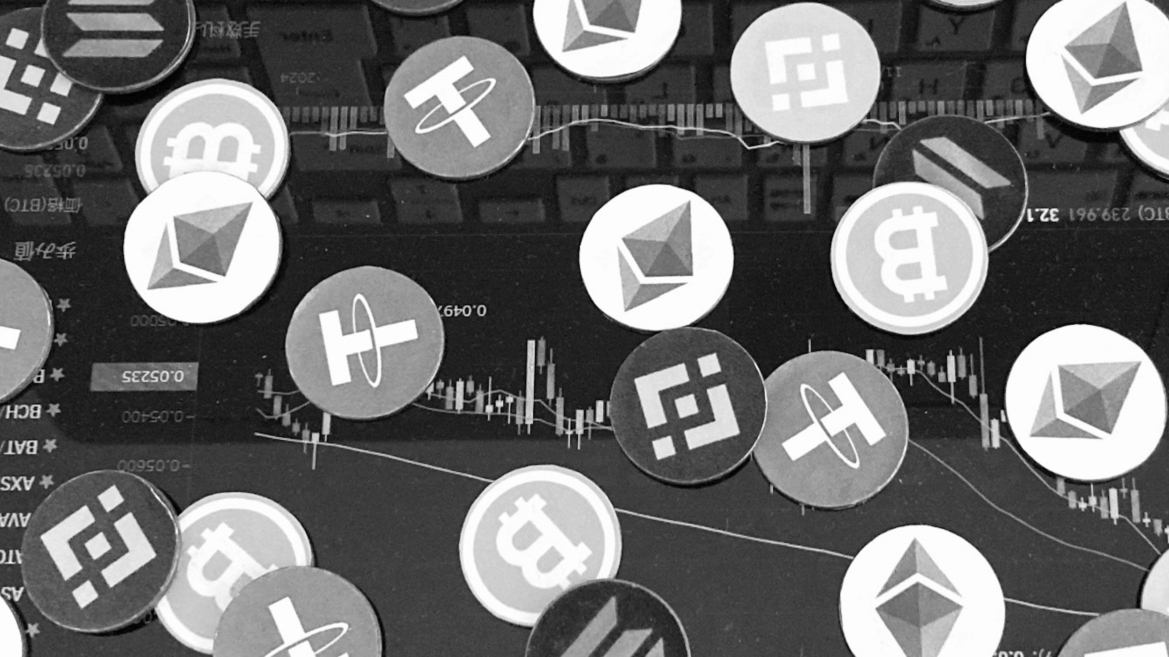 Various cryptocurrency coins floating on a dark background with graphs