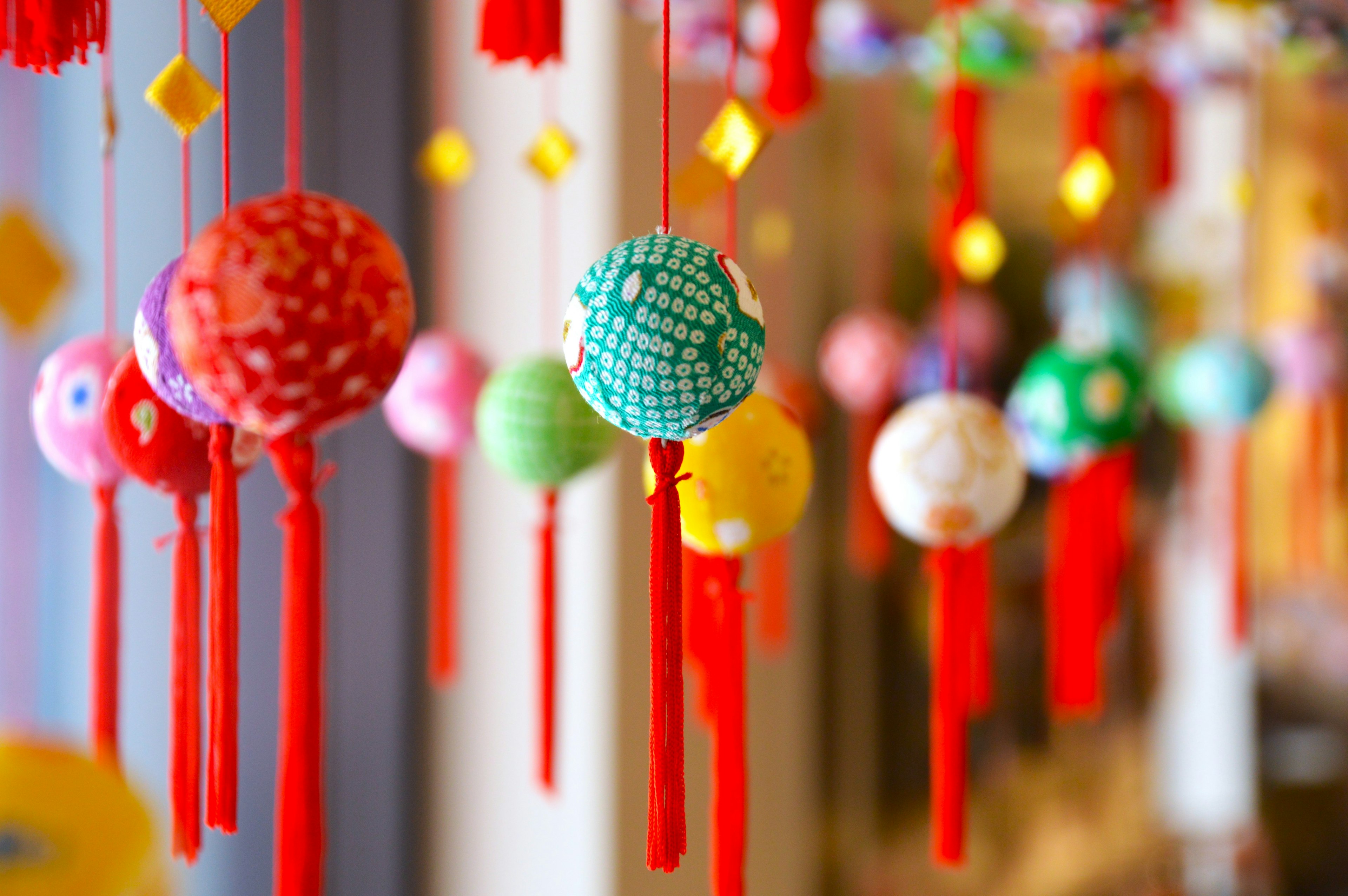 Colorful lanterns hanging in a decorative setting