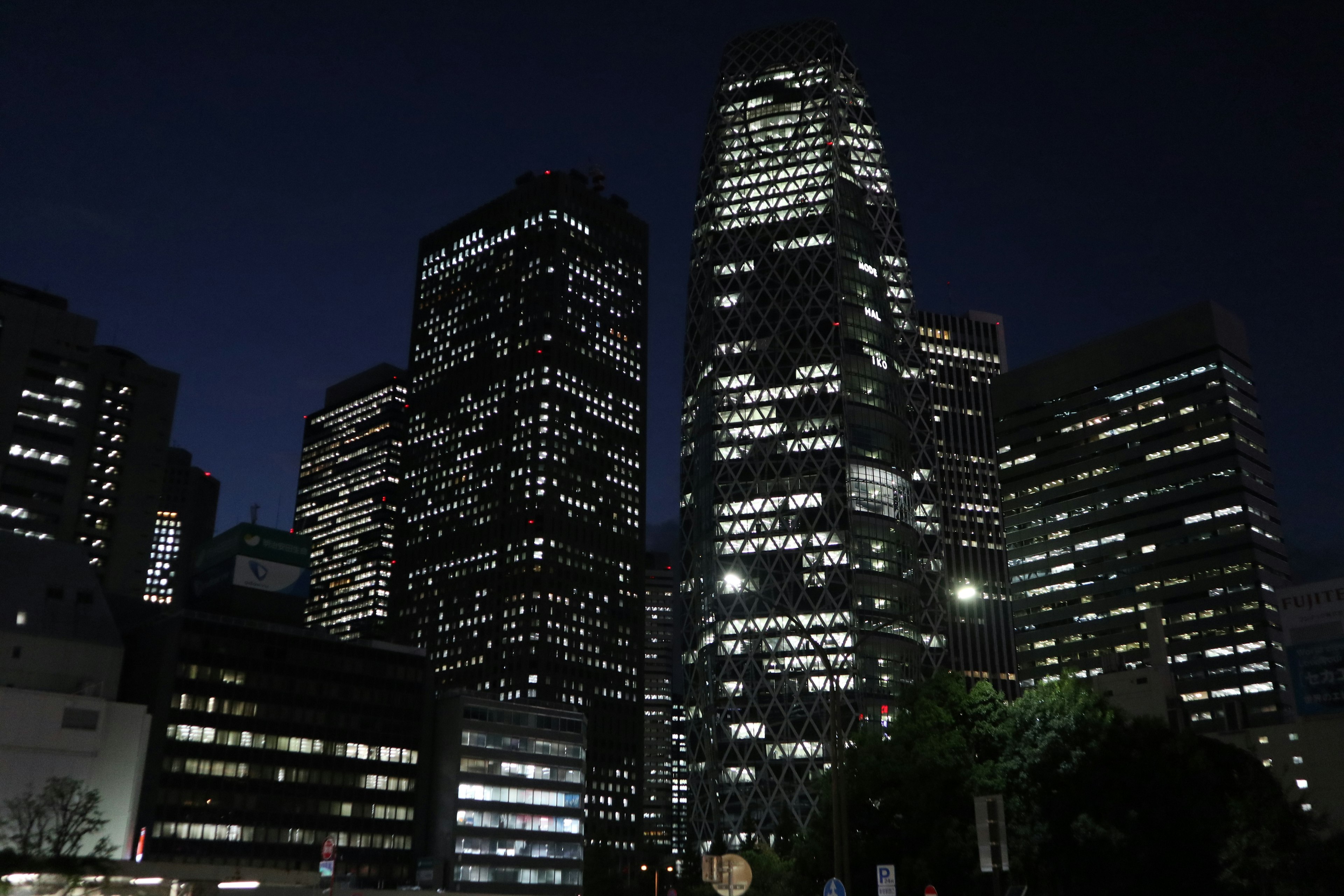 Night cityscape with illuminated skyscrapers