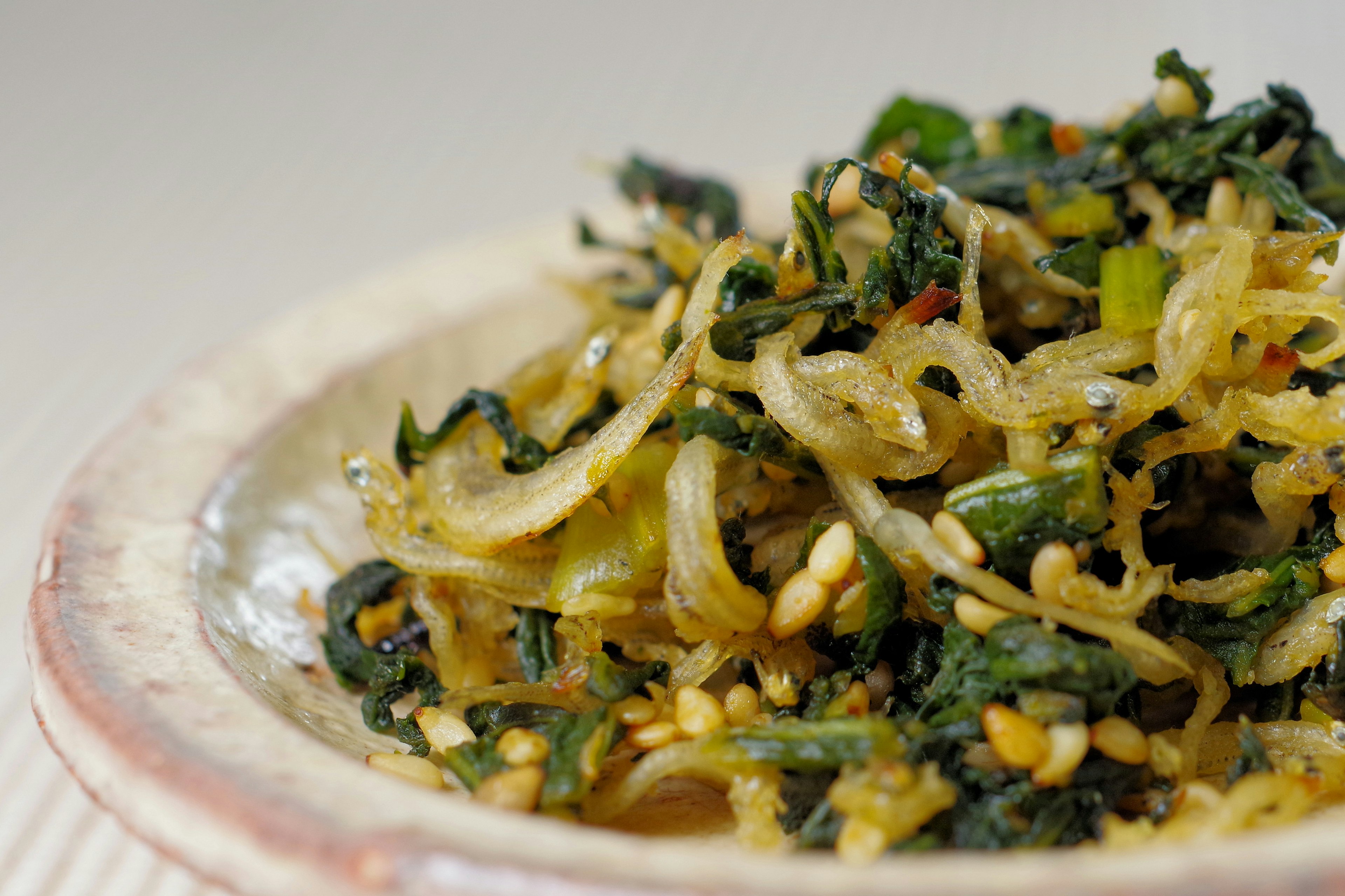 A plate of cooked seaweed and vegetable salad