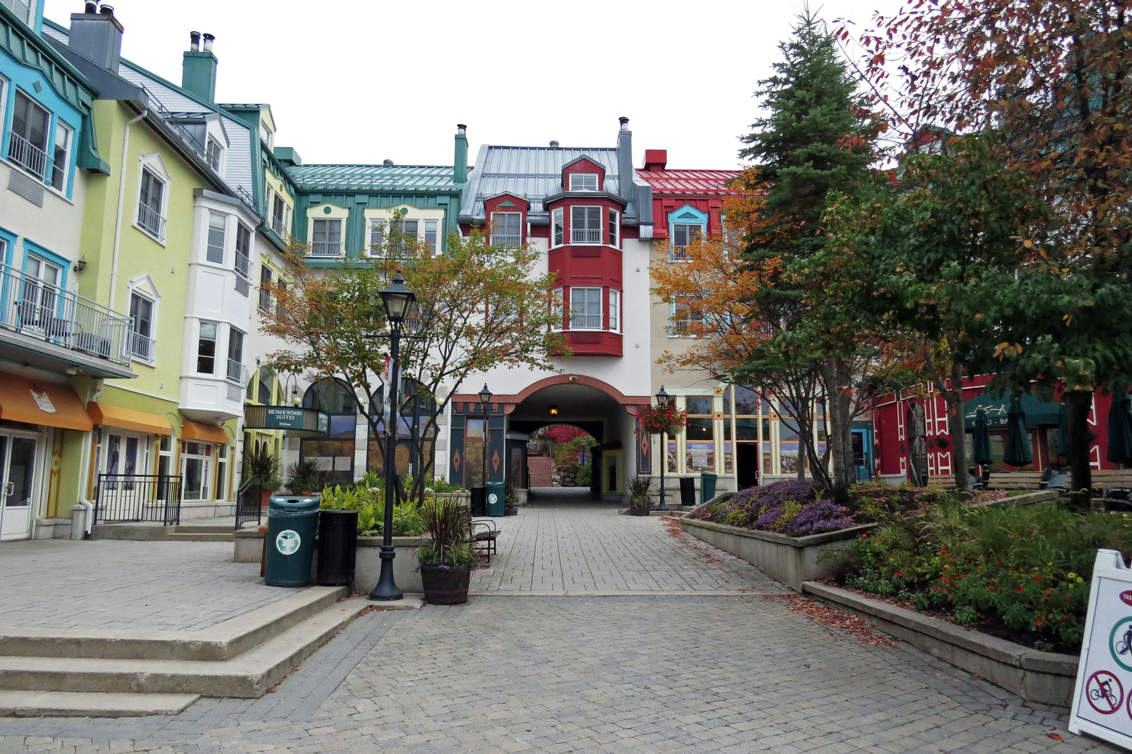 Colorful buildings lining a square in a village