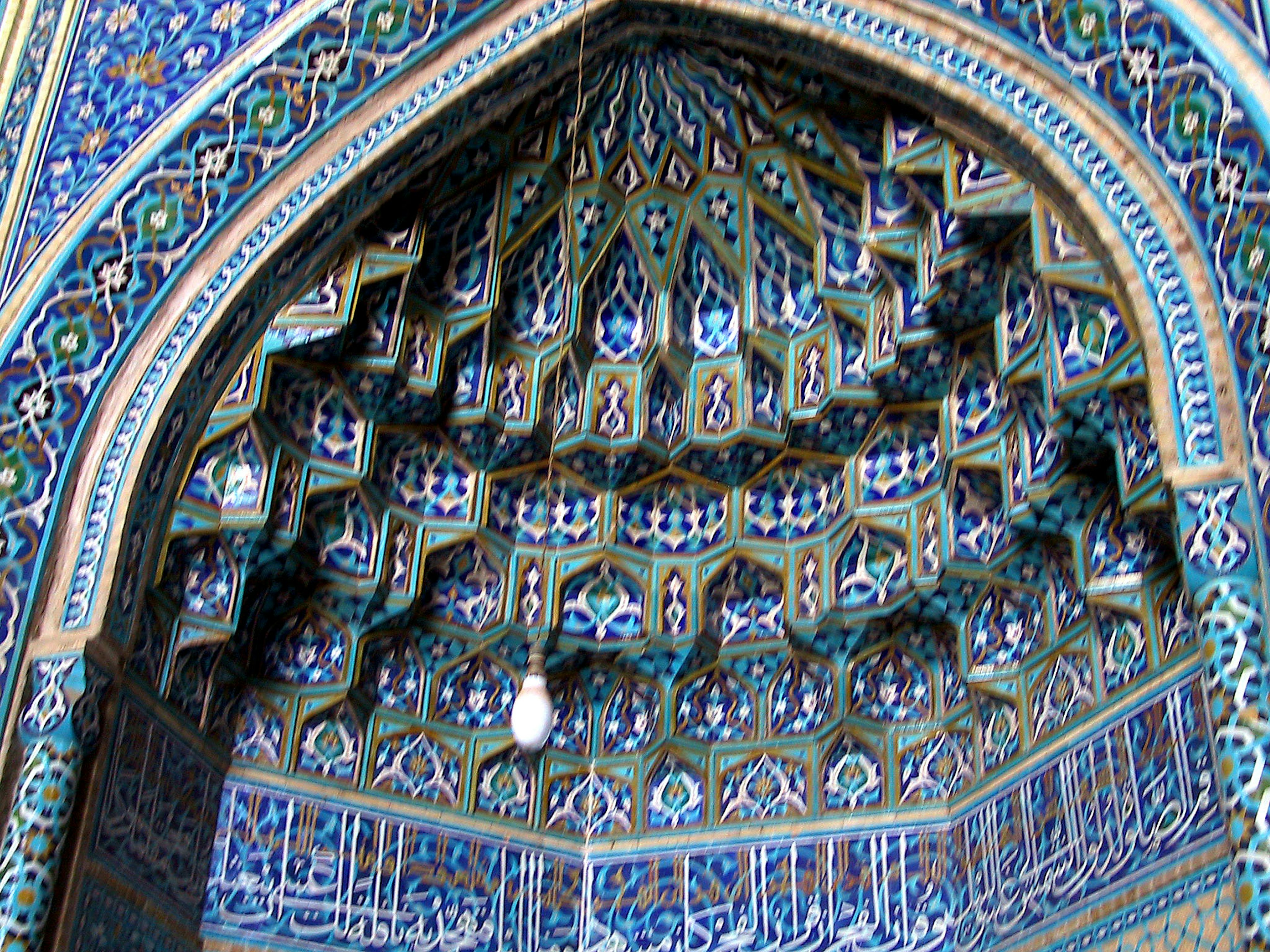 Intricately designed arched ceiling with vibrant mosaic patterns