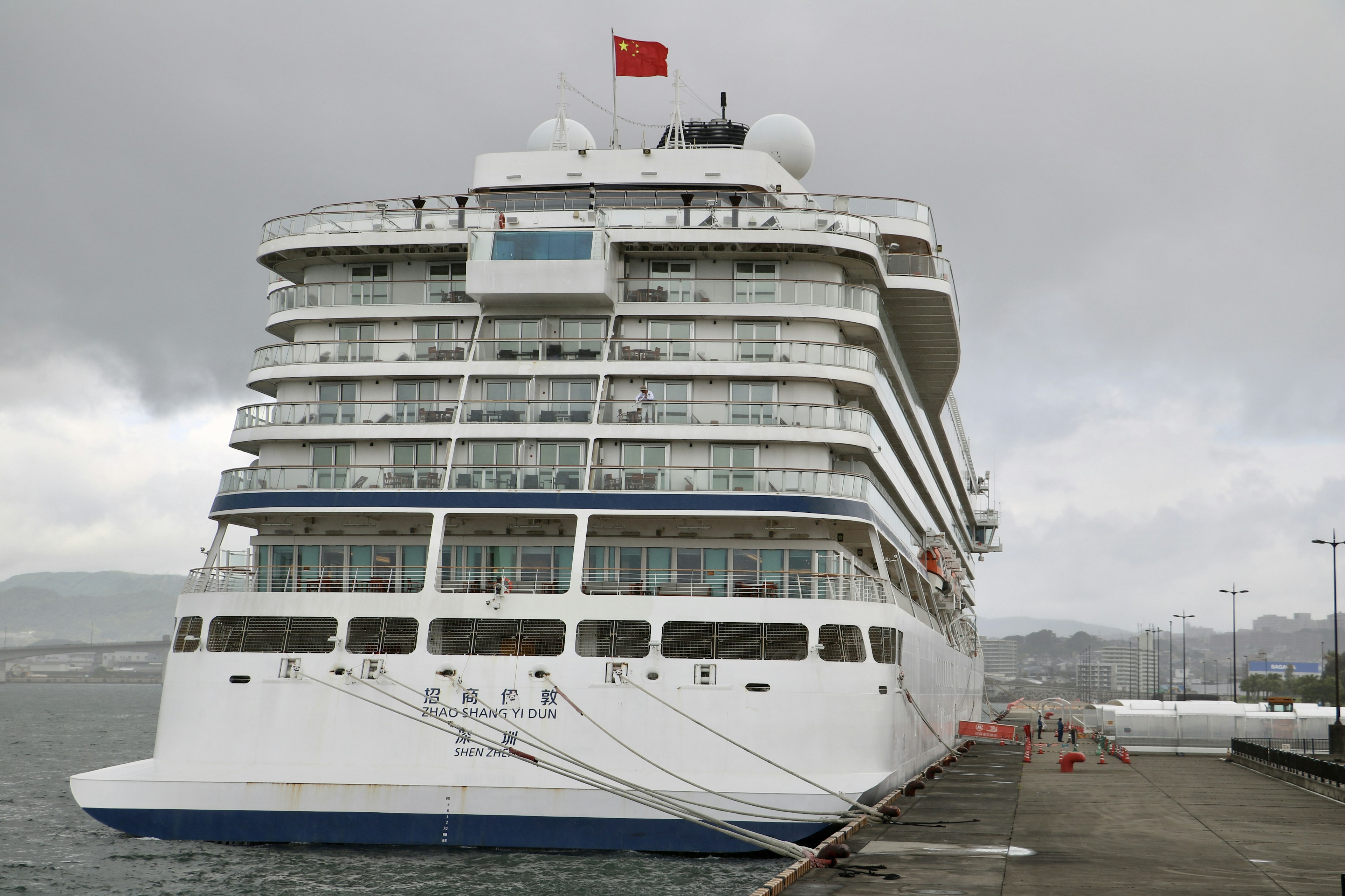 Large cruise ship docked at the port