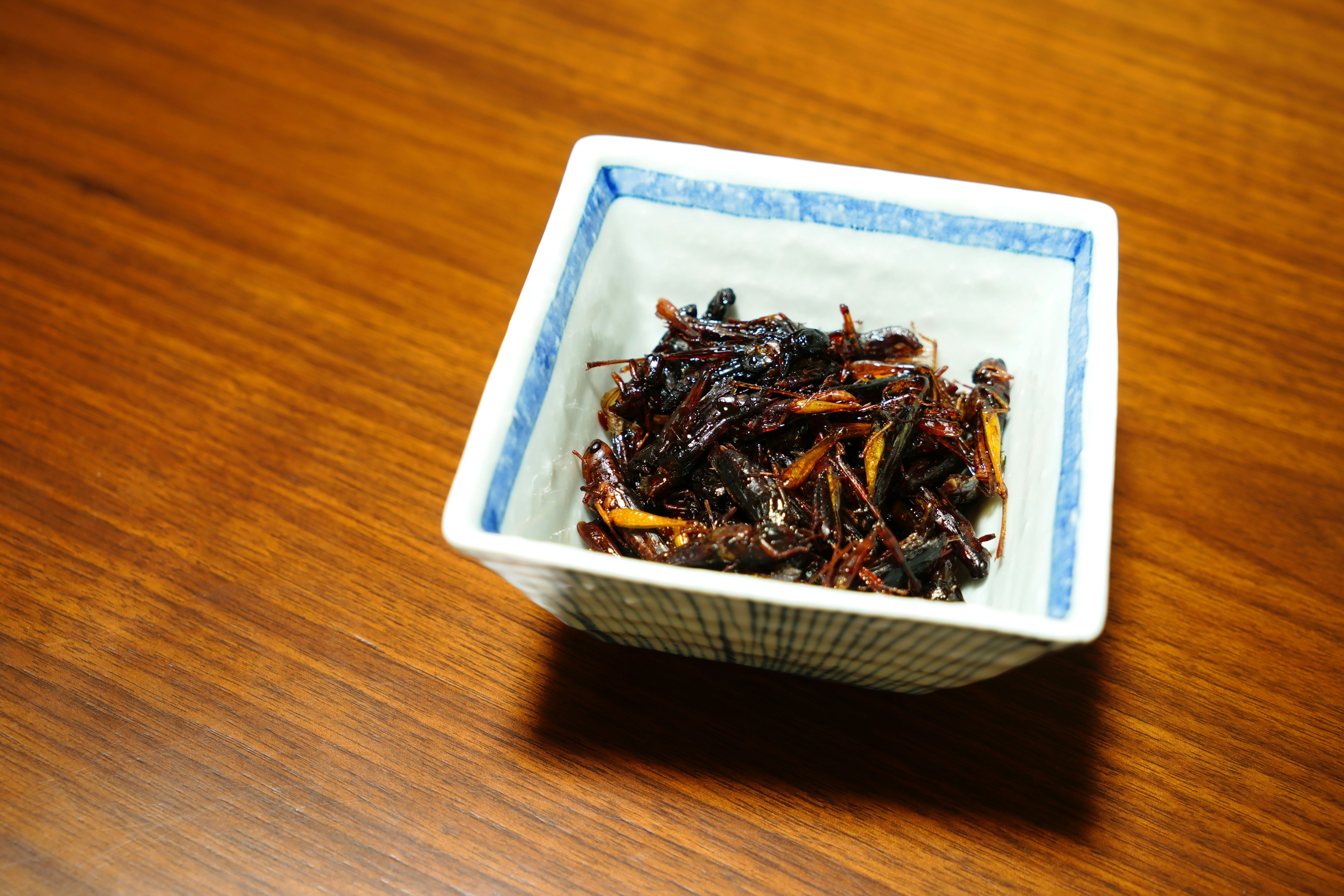 Sweet and savory tsukudani served in a Japanese-style bowl