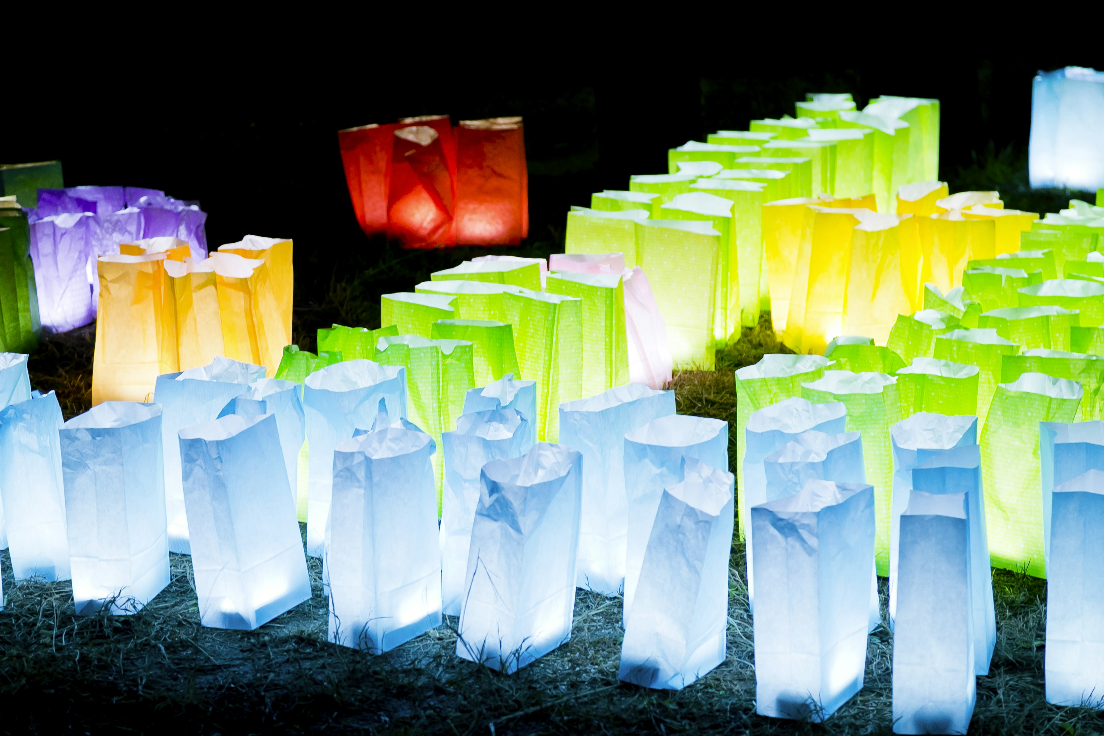 Colorful glowing transparent crystal blocks arranged in patterns