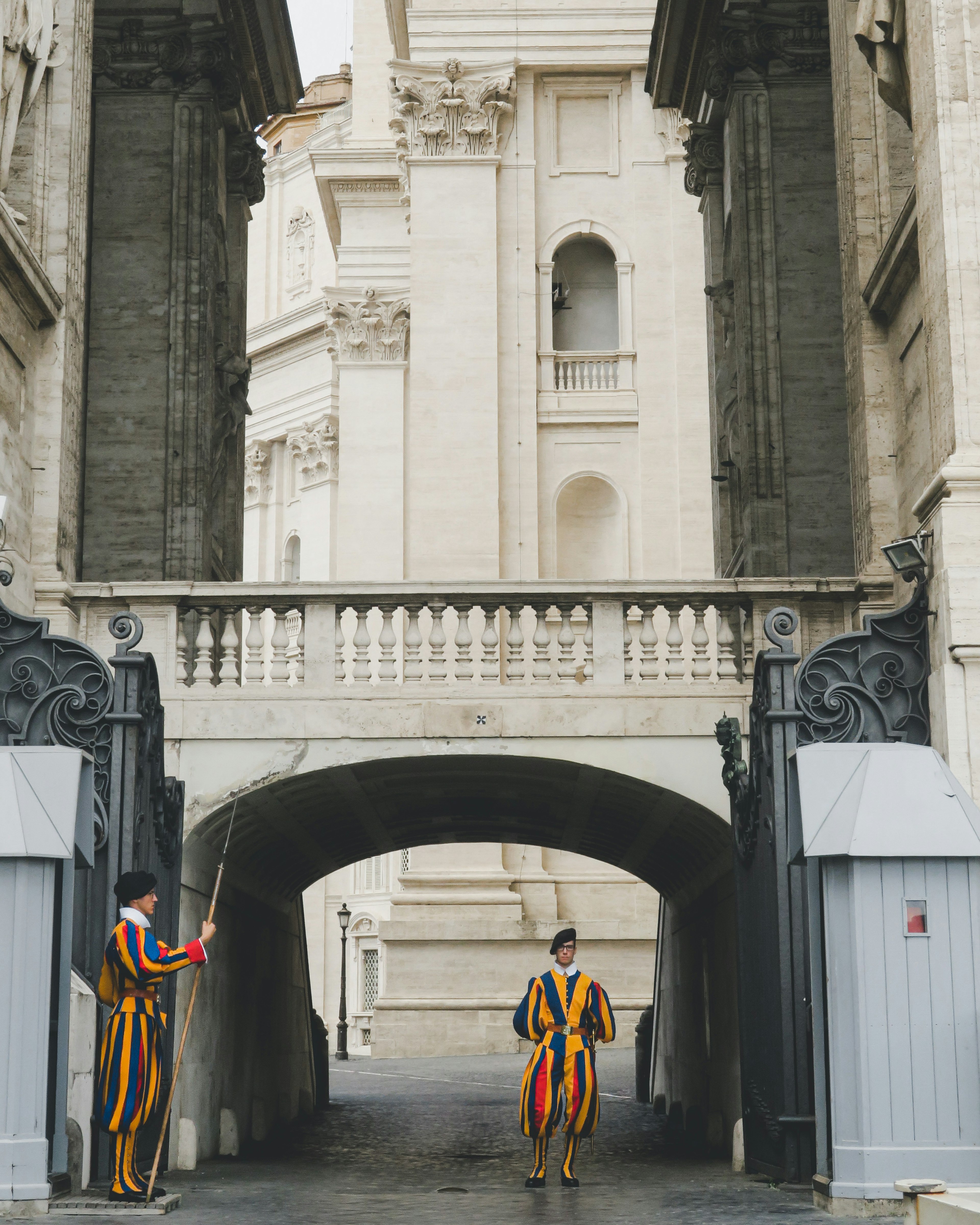 Photo of Swiss Guards standing at the entrance of Vatican City