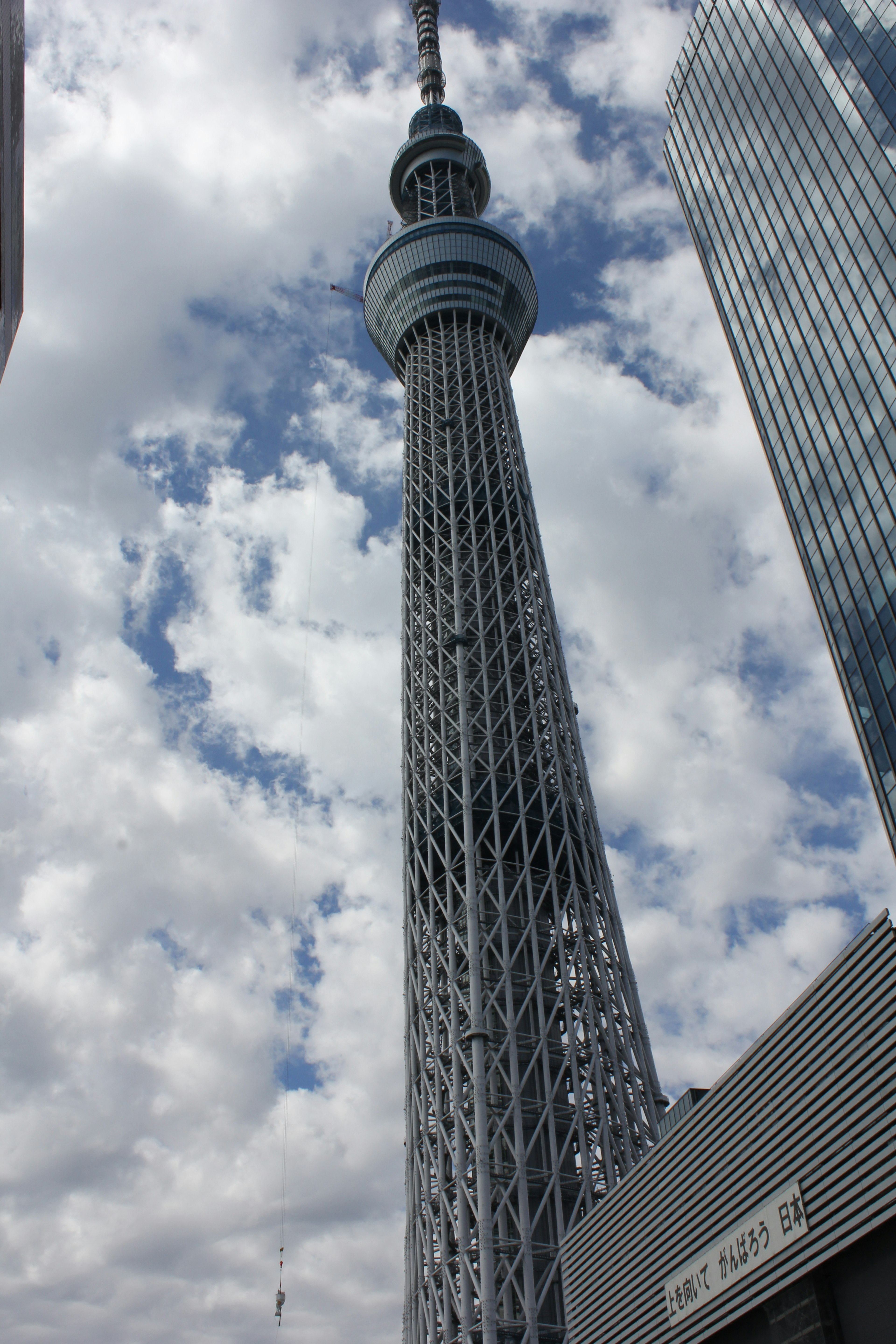 Tokyo Skytree towering against a cloudy sky