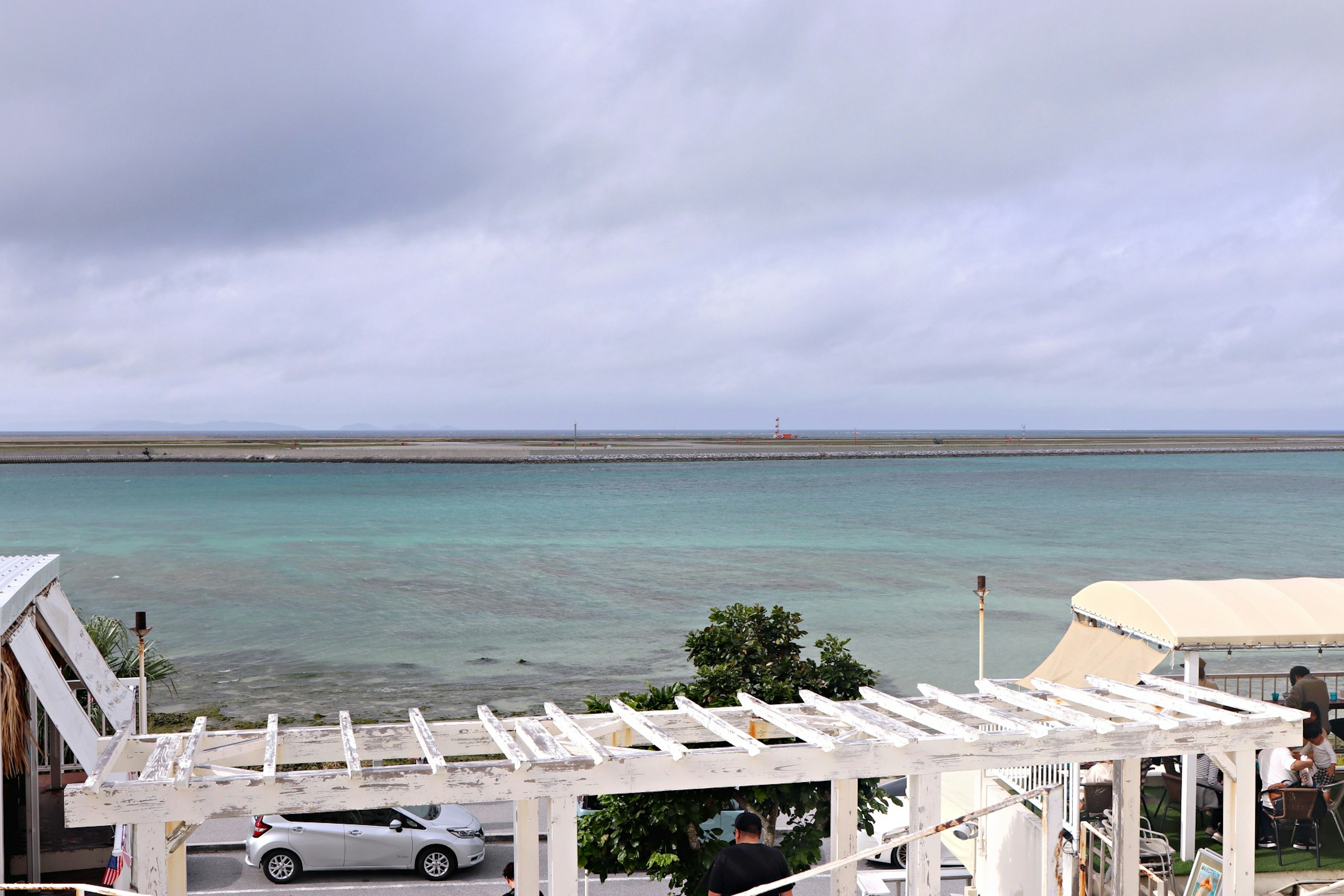 View of turquoise water and white structures