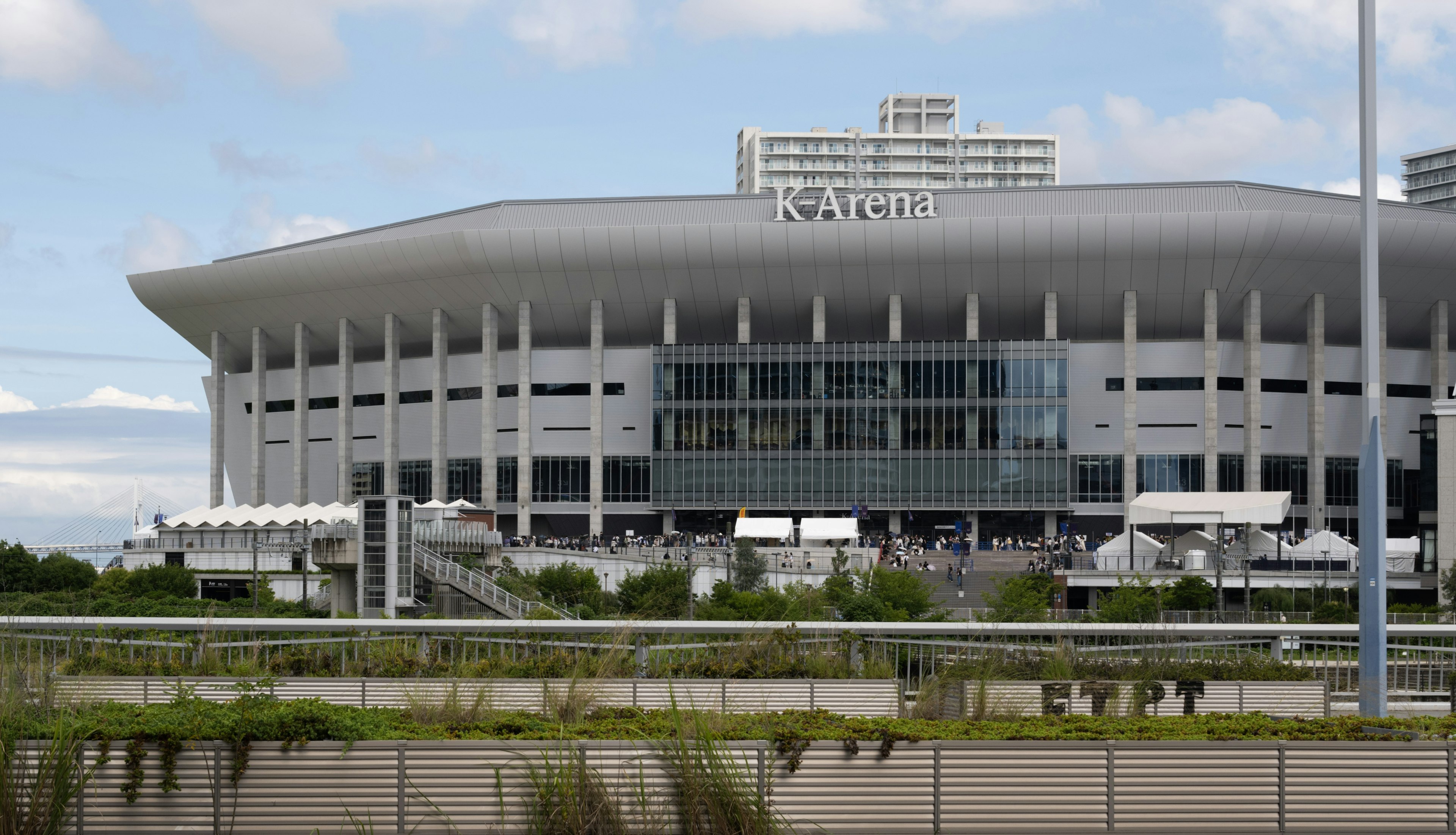 Exterior view of the stadium with surrounding landscape