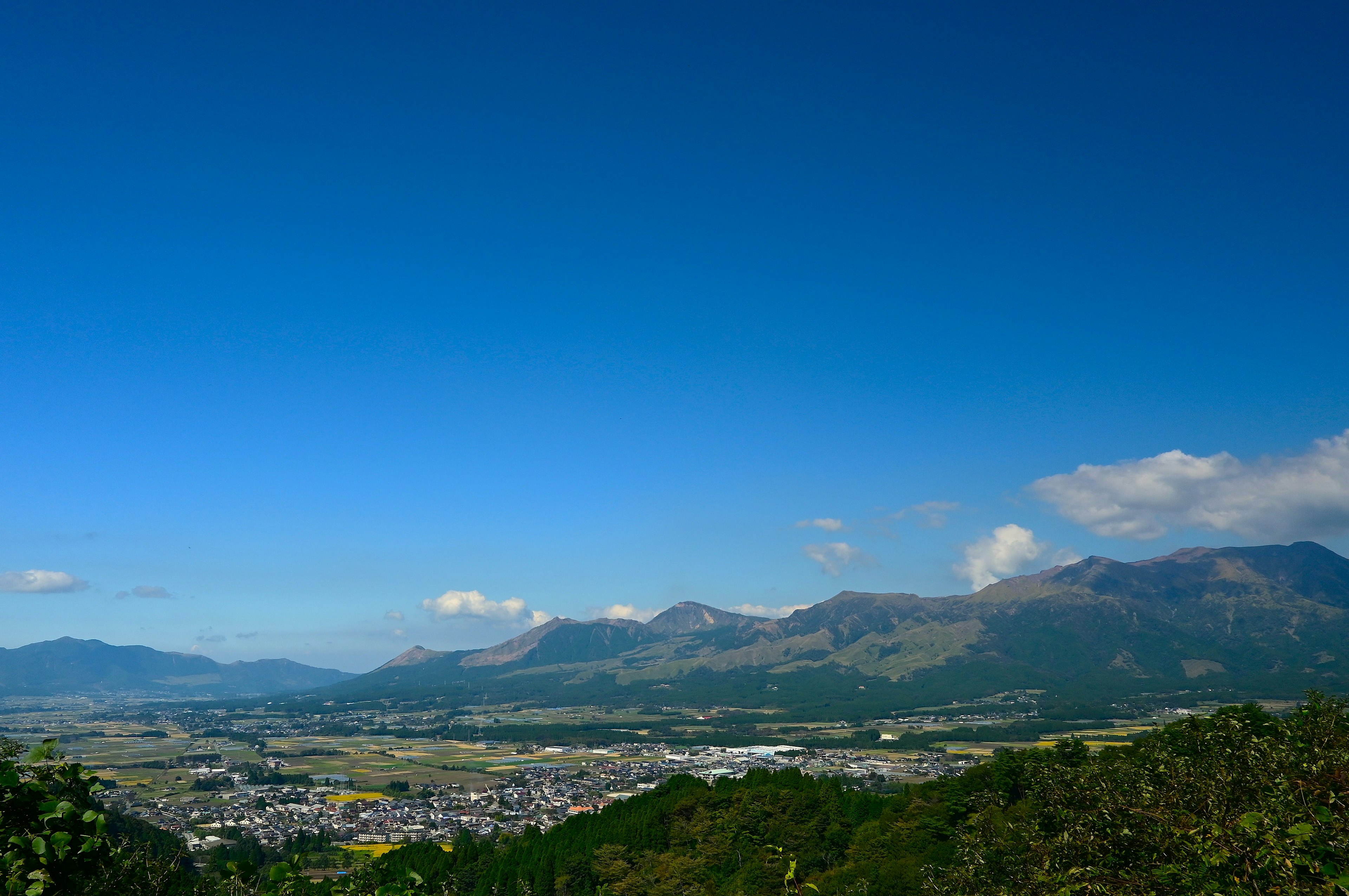 Panoramic view of a beautiful landscape with blue sky and mountains