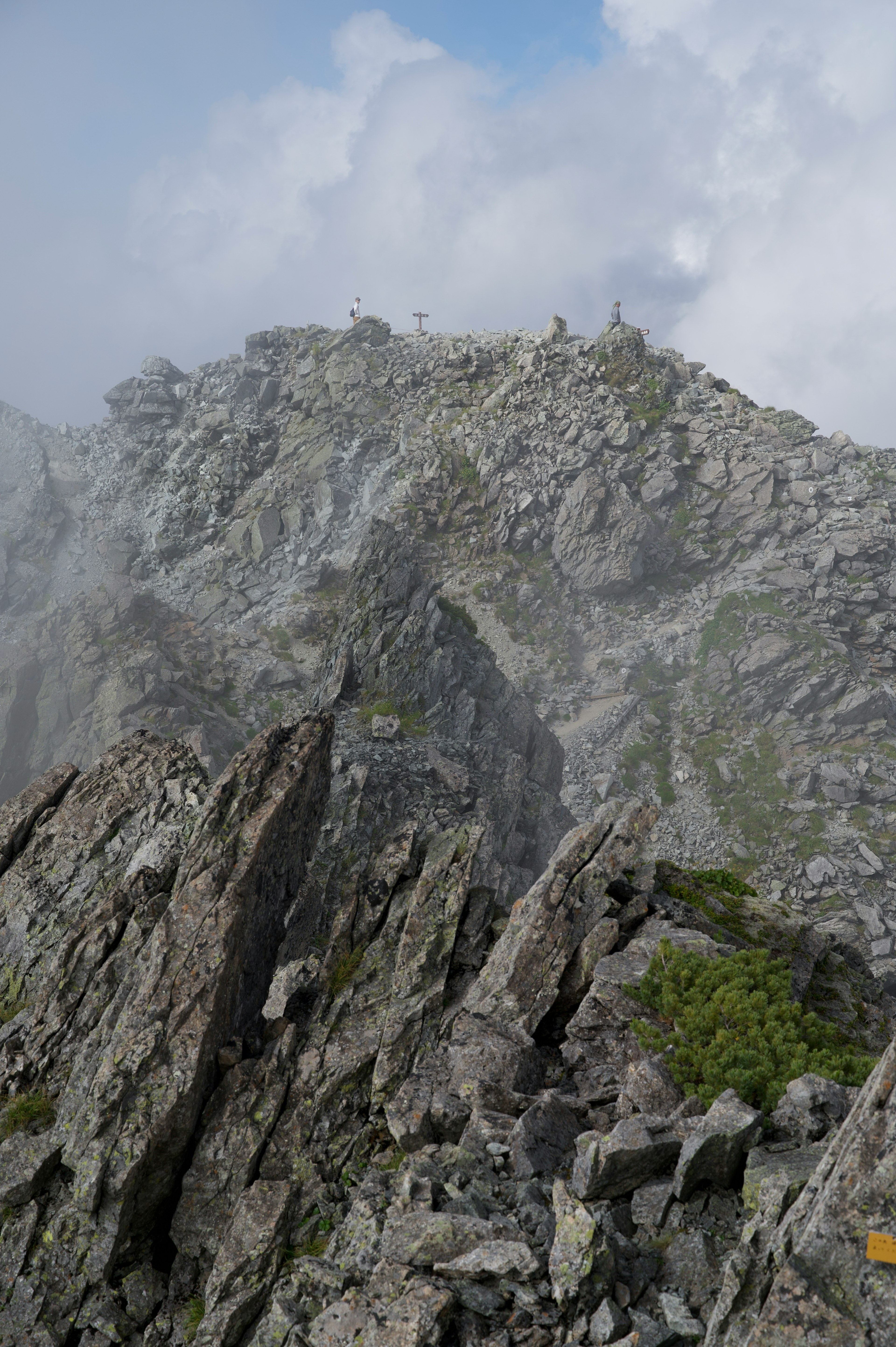 Foggy mountain landscape with rugged cliffs