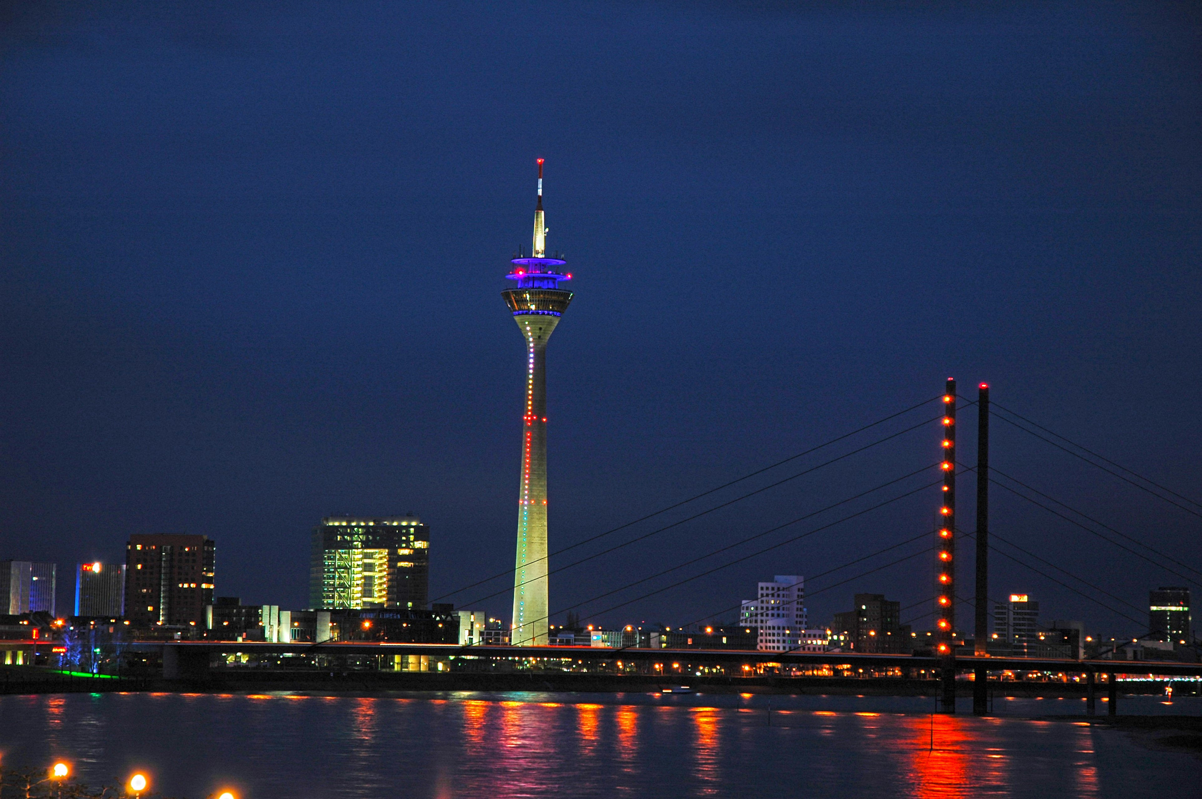 Night view of Kuala Lumpur Tower with surrounding cityscape