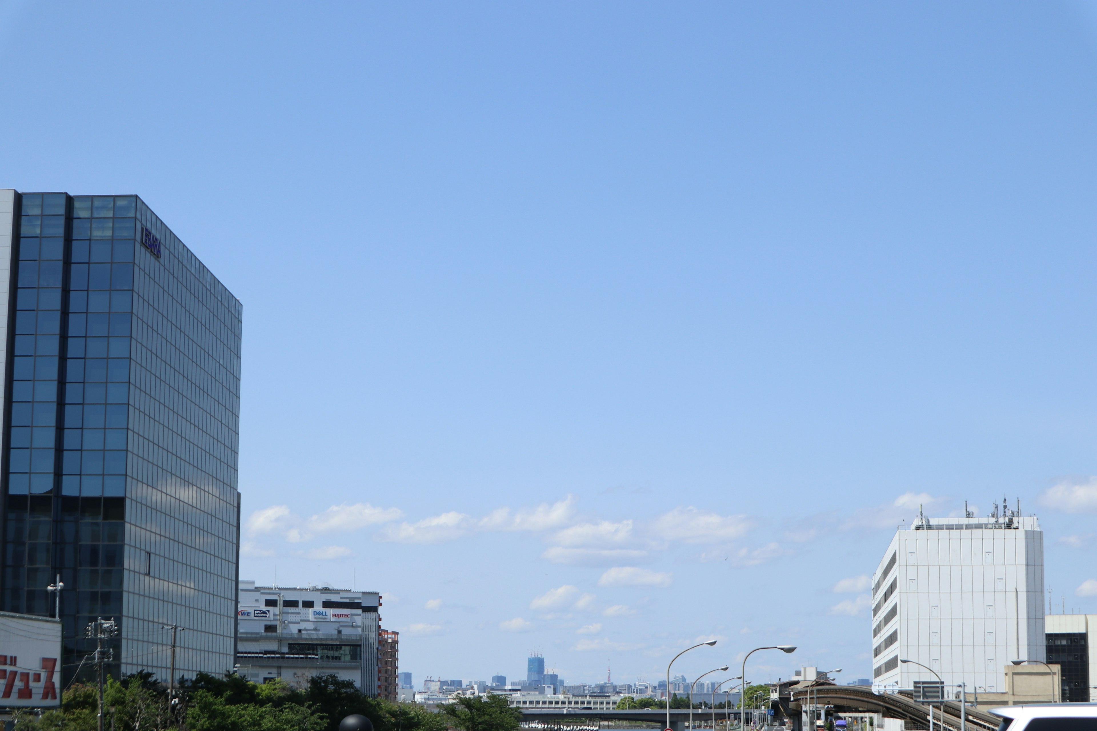 City skyline with clear blue sky and modern buildings