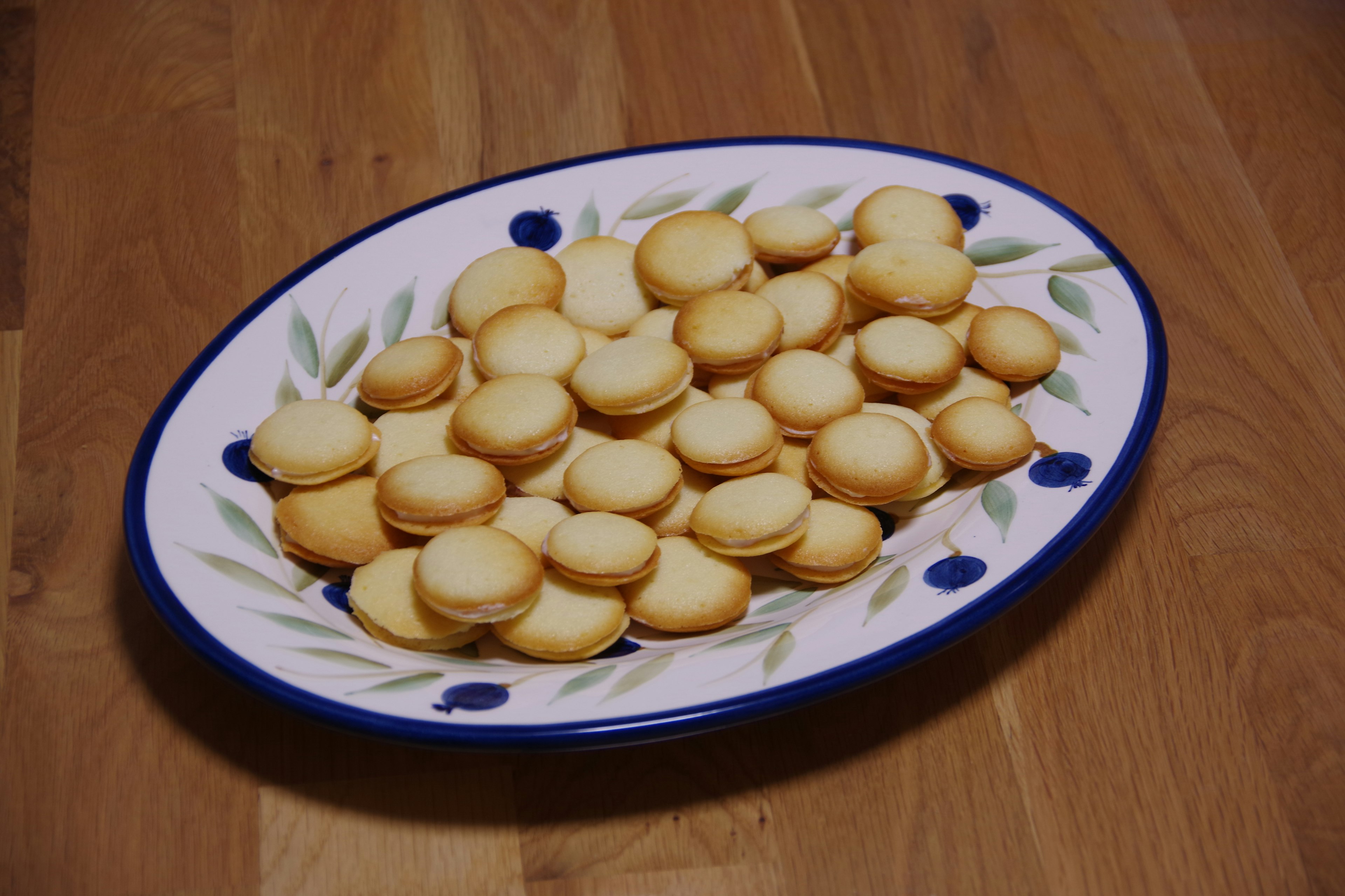 A platter of baked treats arranged on a decorative plate