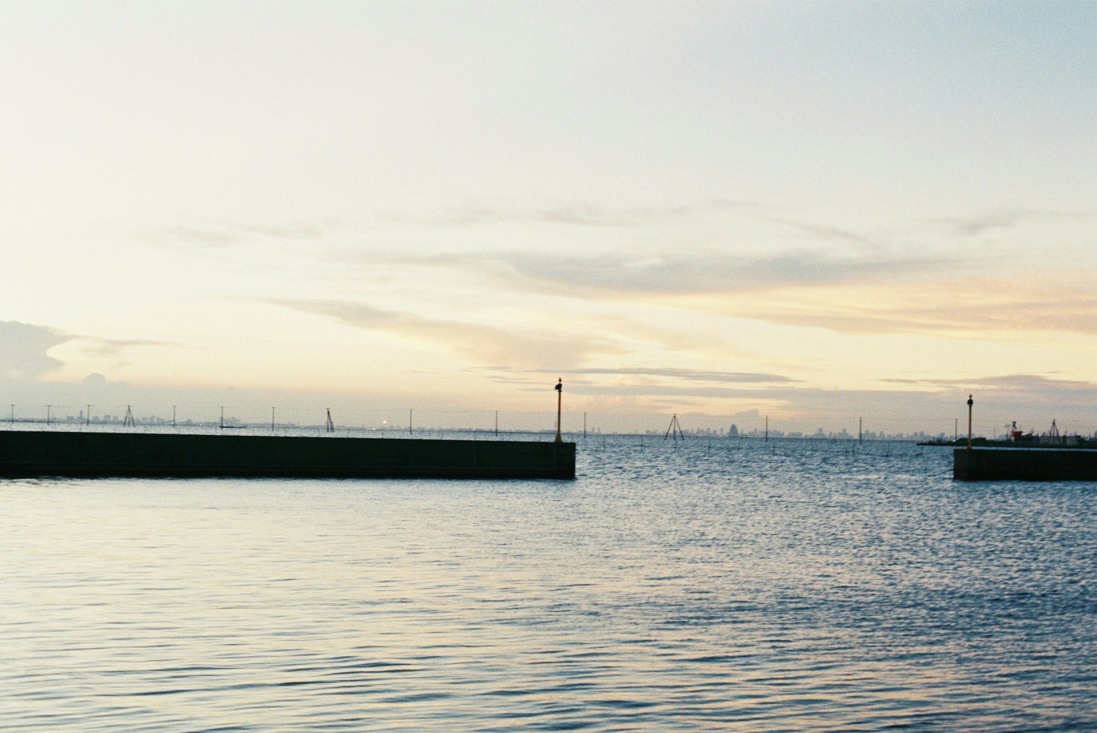 Calm sea view with clouds in the evening sky