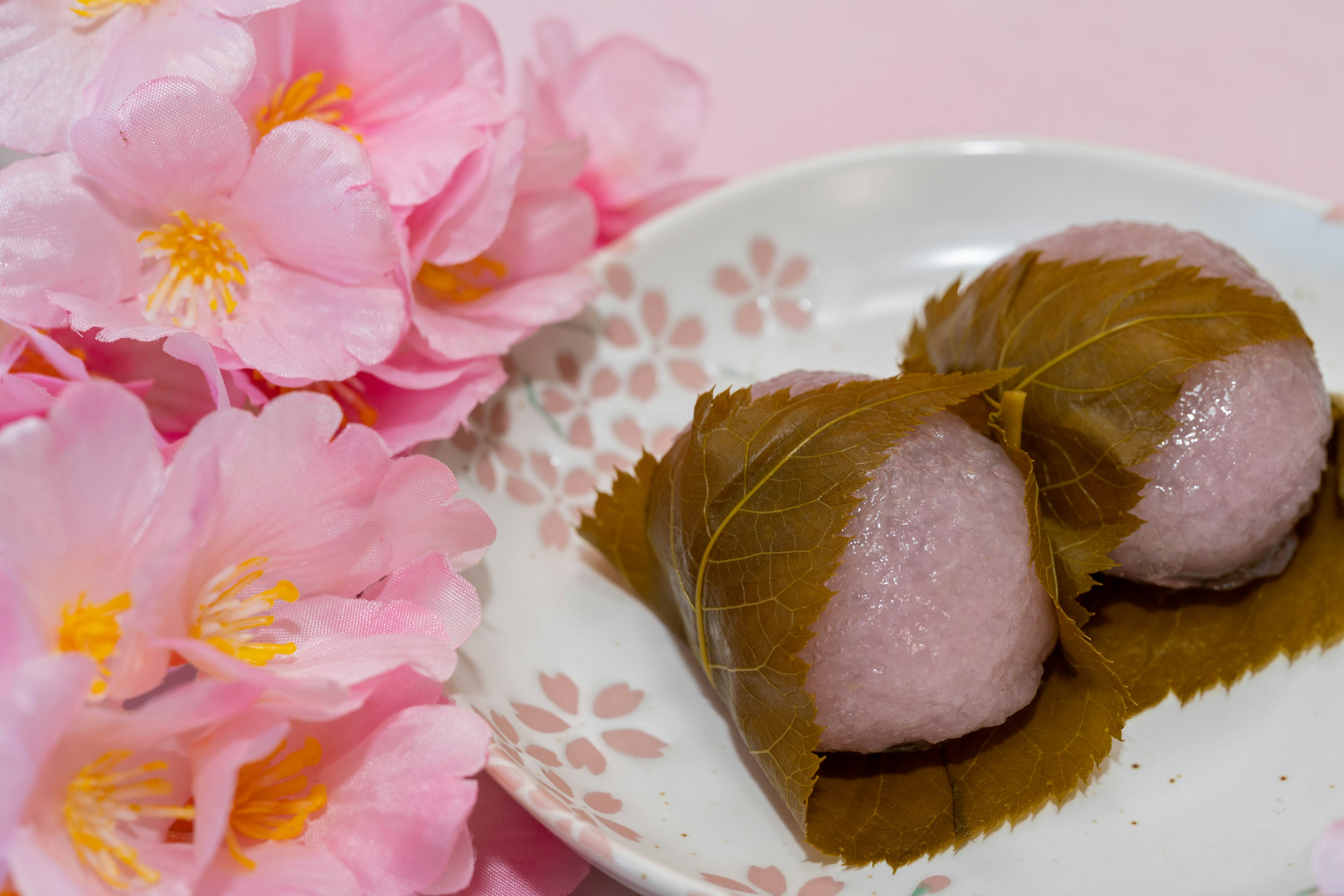 Beautiful display of sakura flowers and traditional Japanese sweets