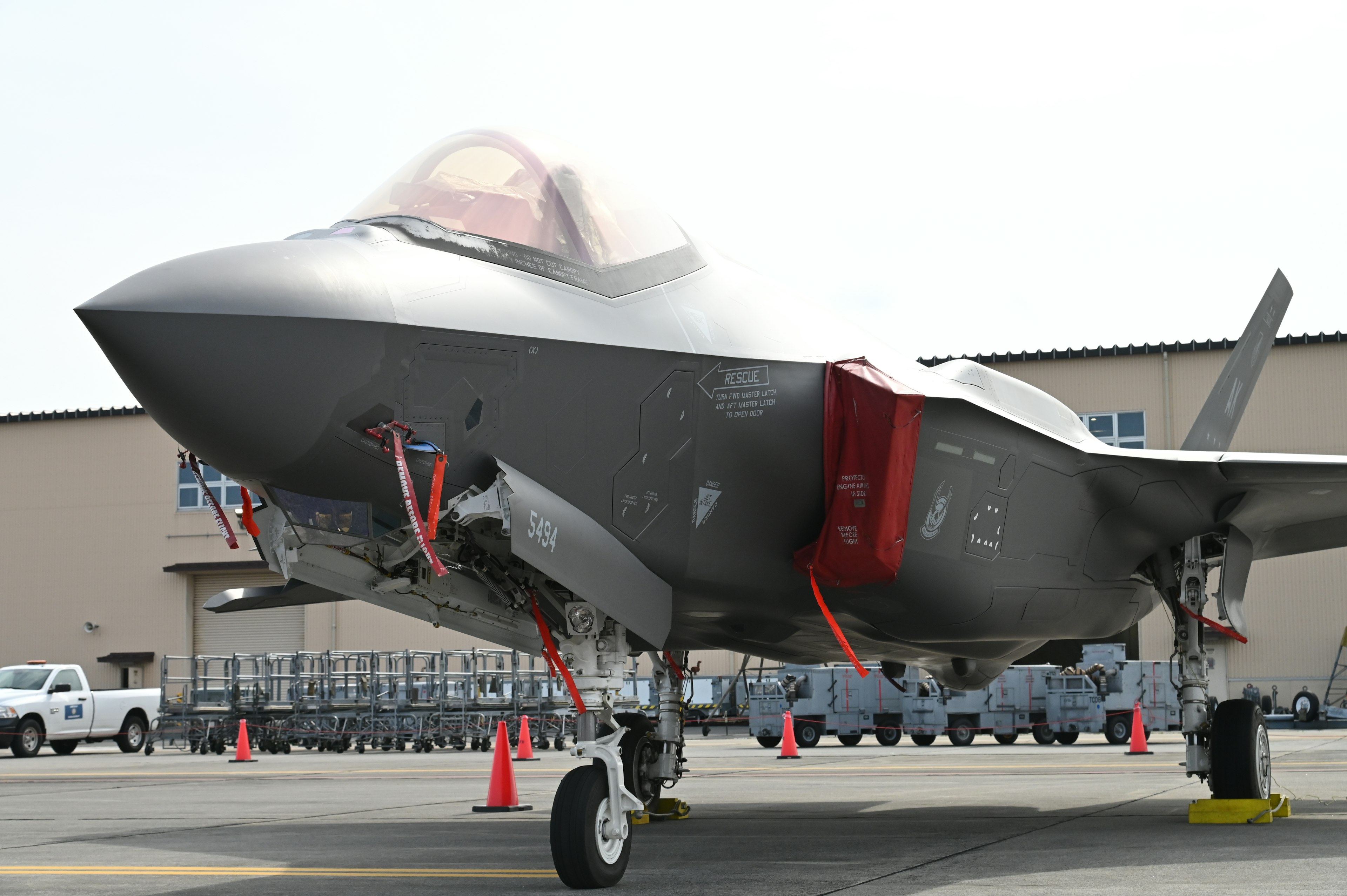 Front view of an F-35 fighter jet on a tarmac