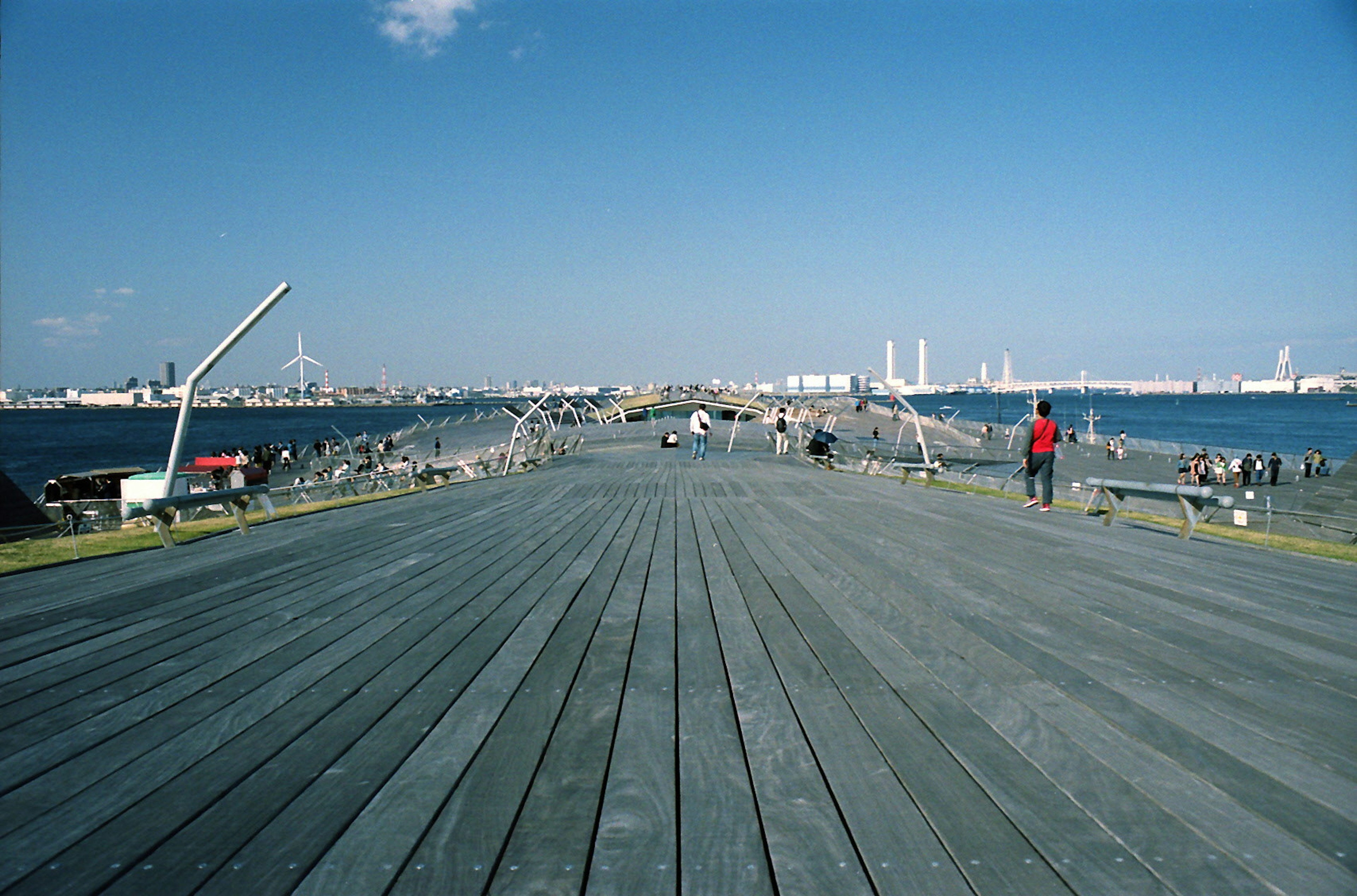 Wide pier with blue sky and ocean view