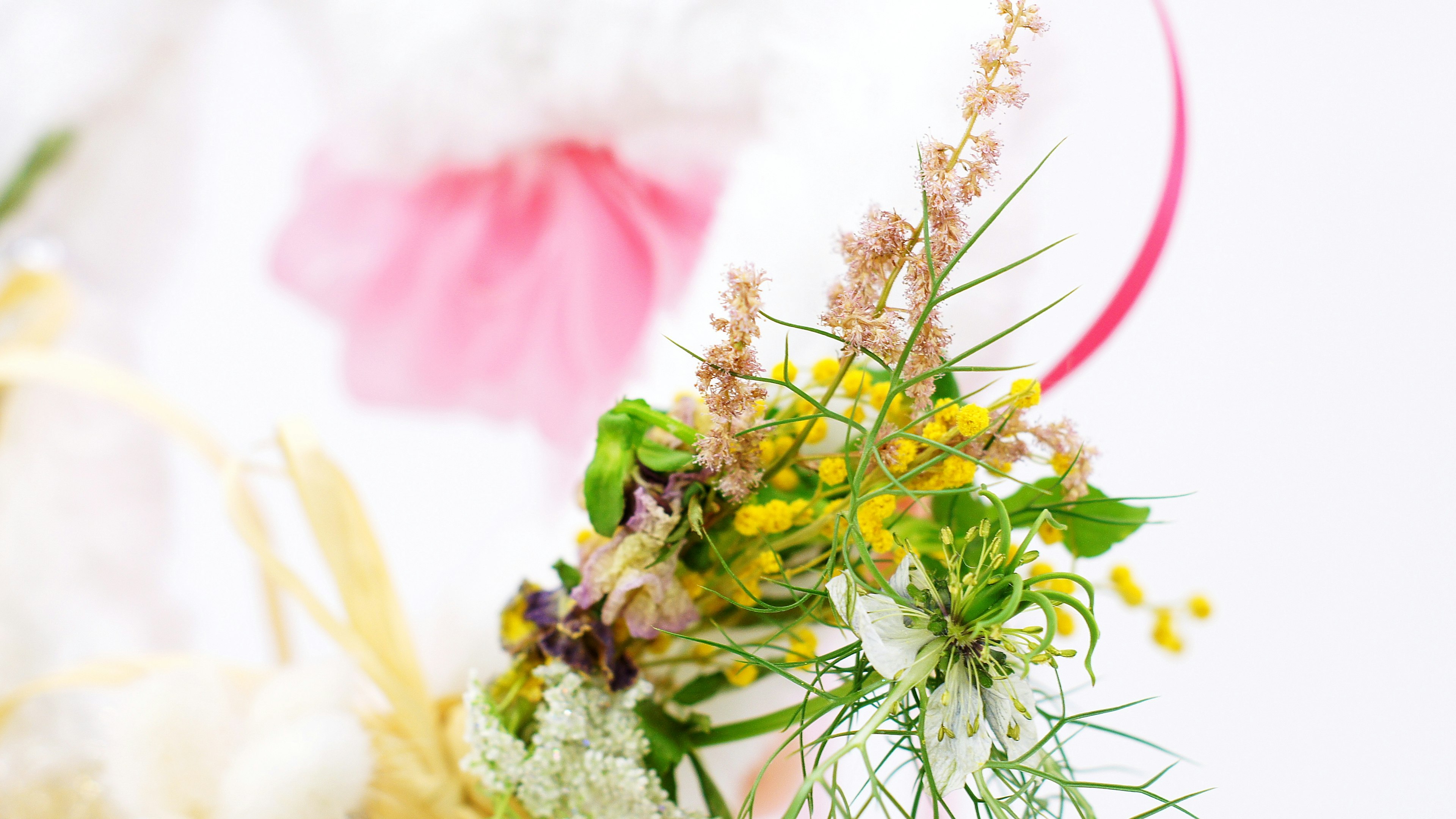 Floral arrangement featuring vibrant flowers and greenery