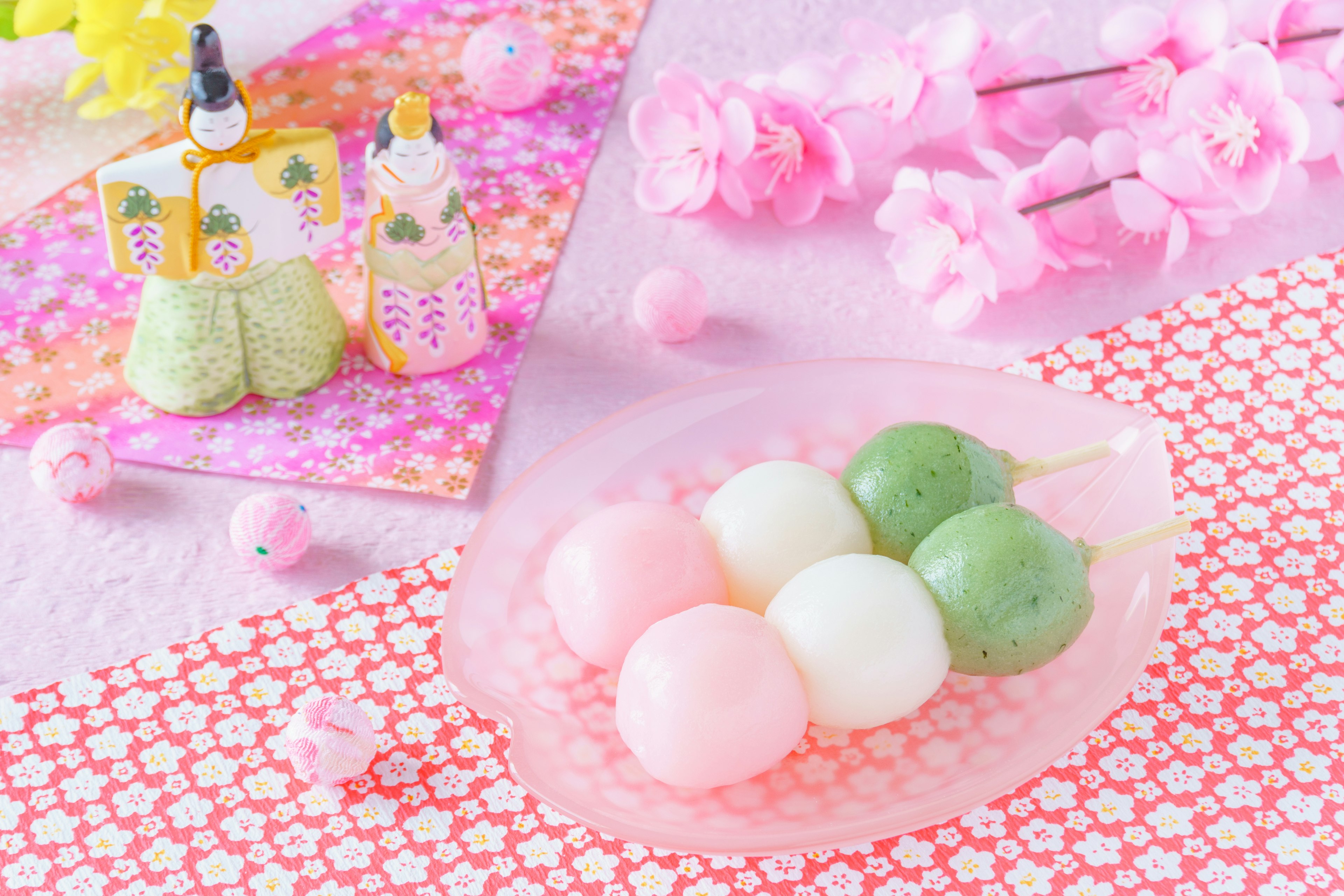 Colorful Japanese sweets for spring festival with floral decorations