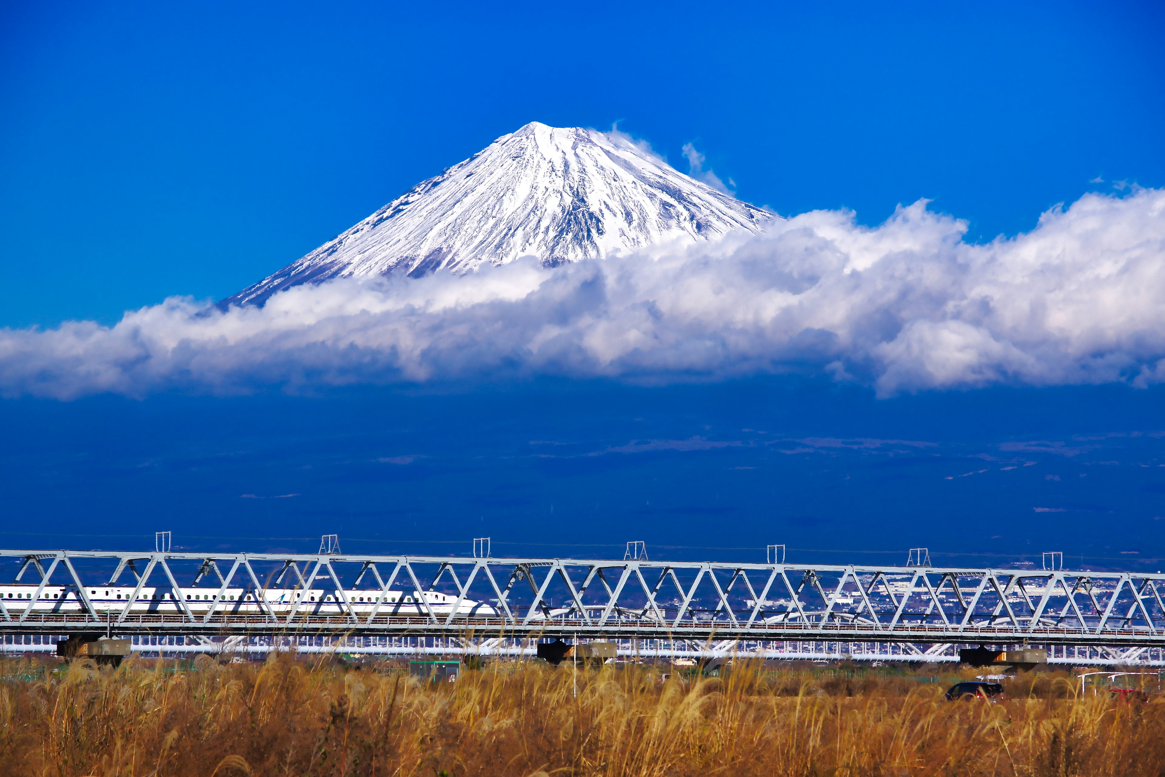 Scenic view of Mount Fuji under a clear blue sky