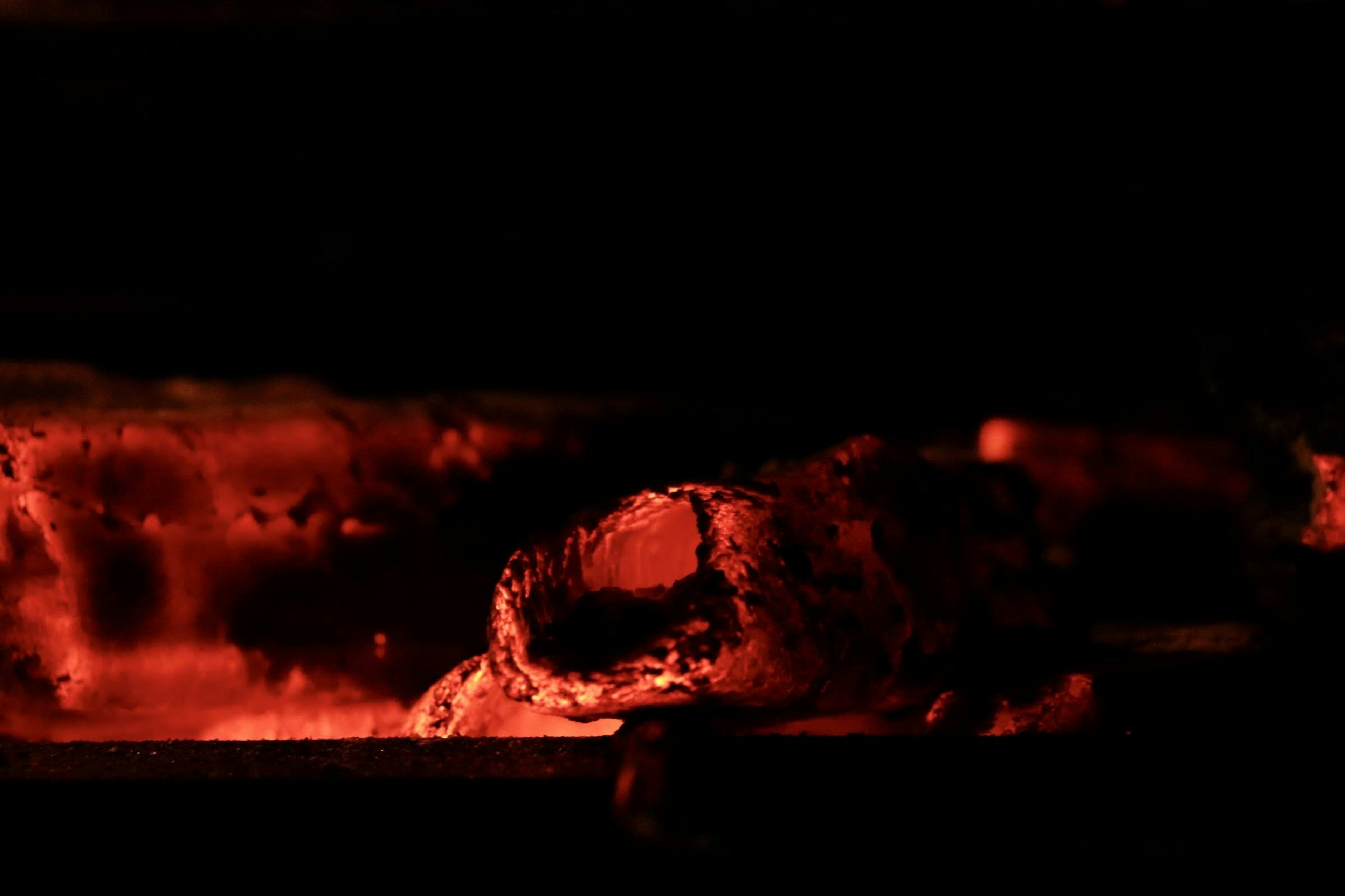 Close-up image of glowing red hot coals