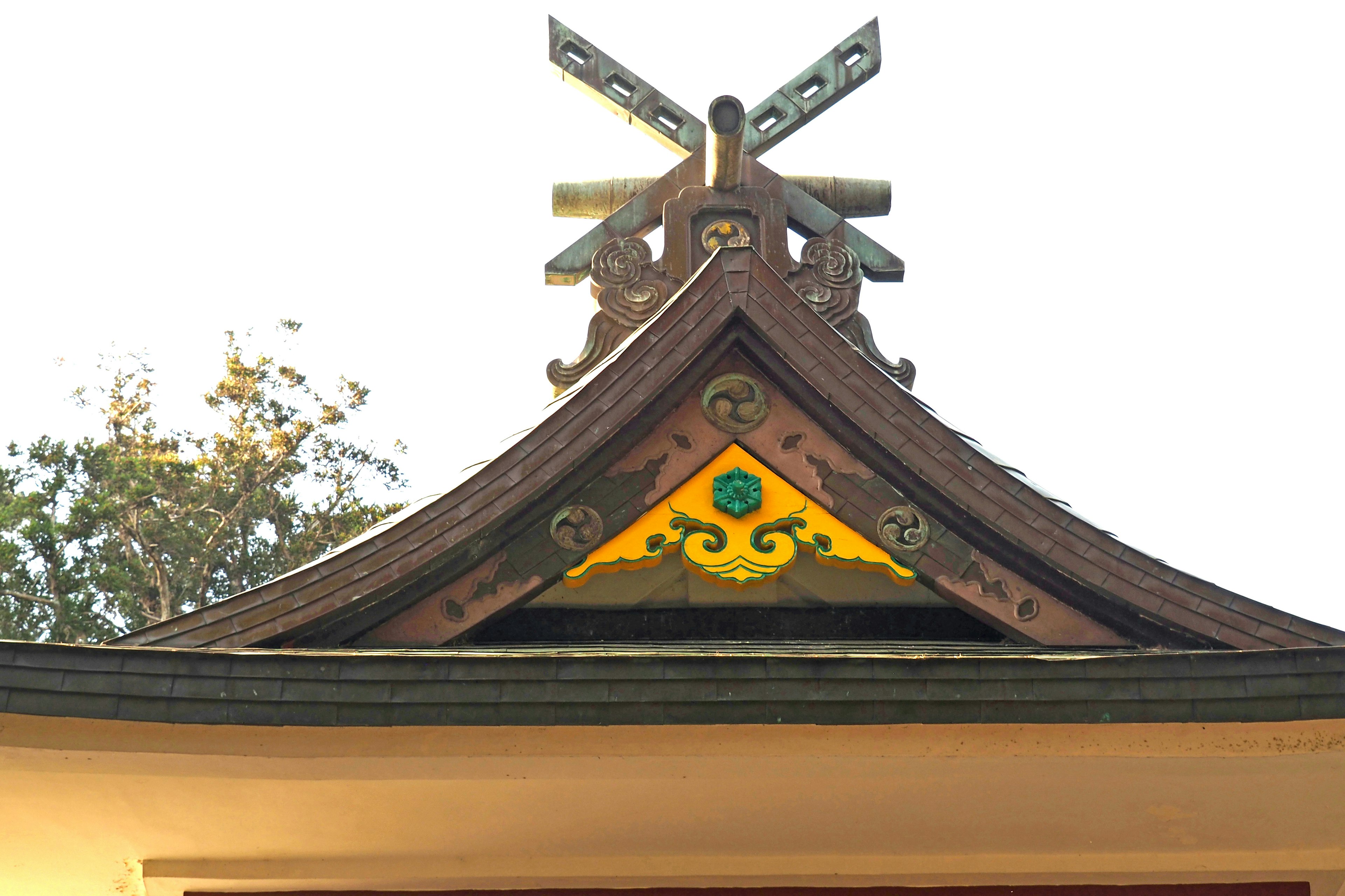 Traditional Japanese architecture featuring ornate roof decorations