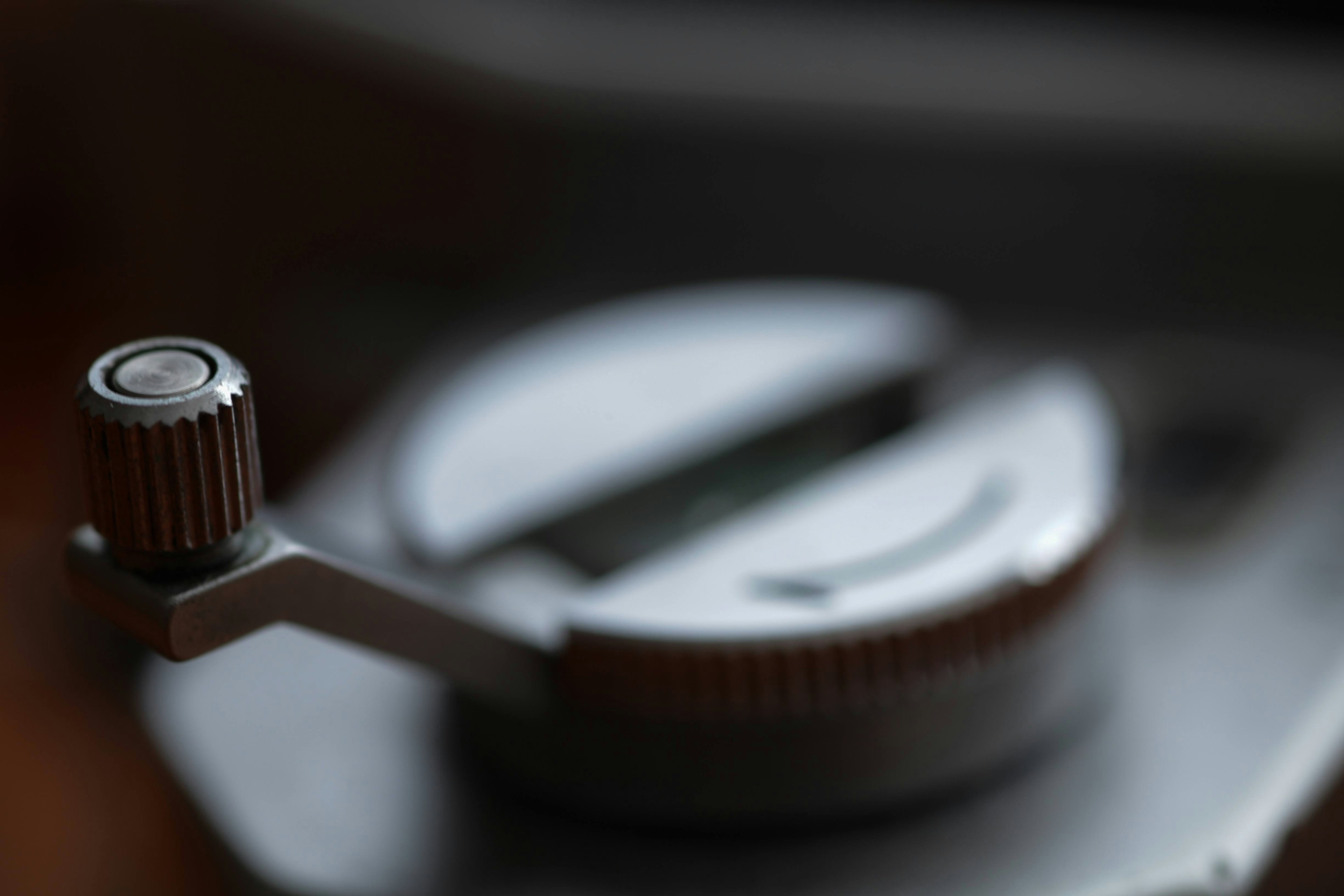 Close-up image of a camera lens adjustment knob