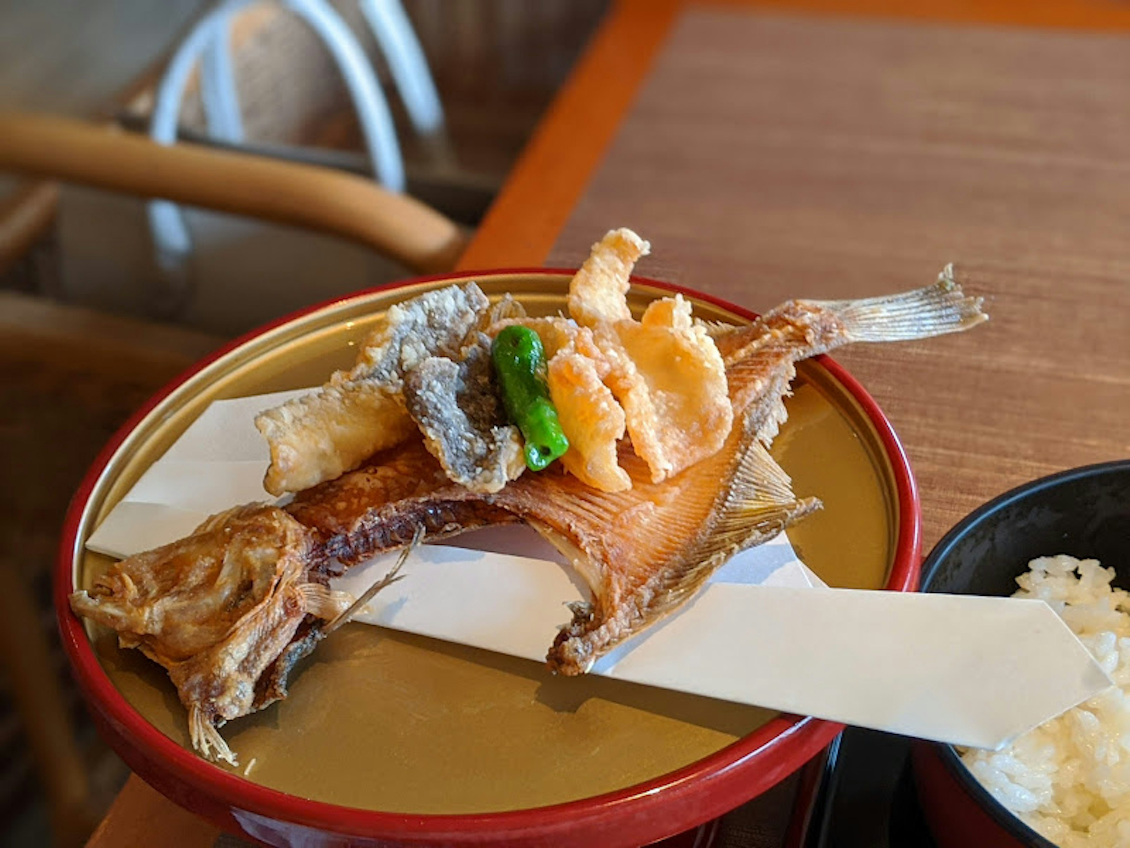 Dish featuring tempura and fish served on a plate