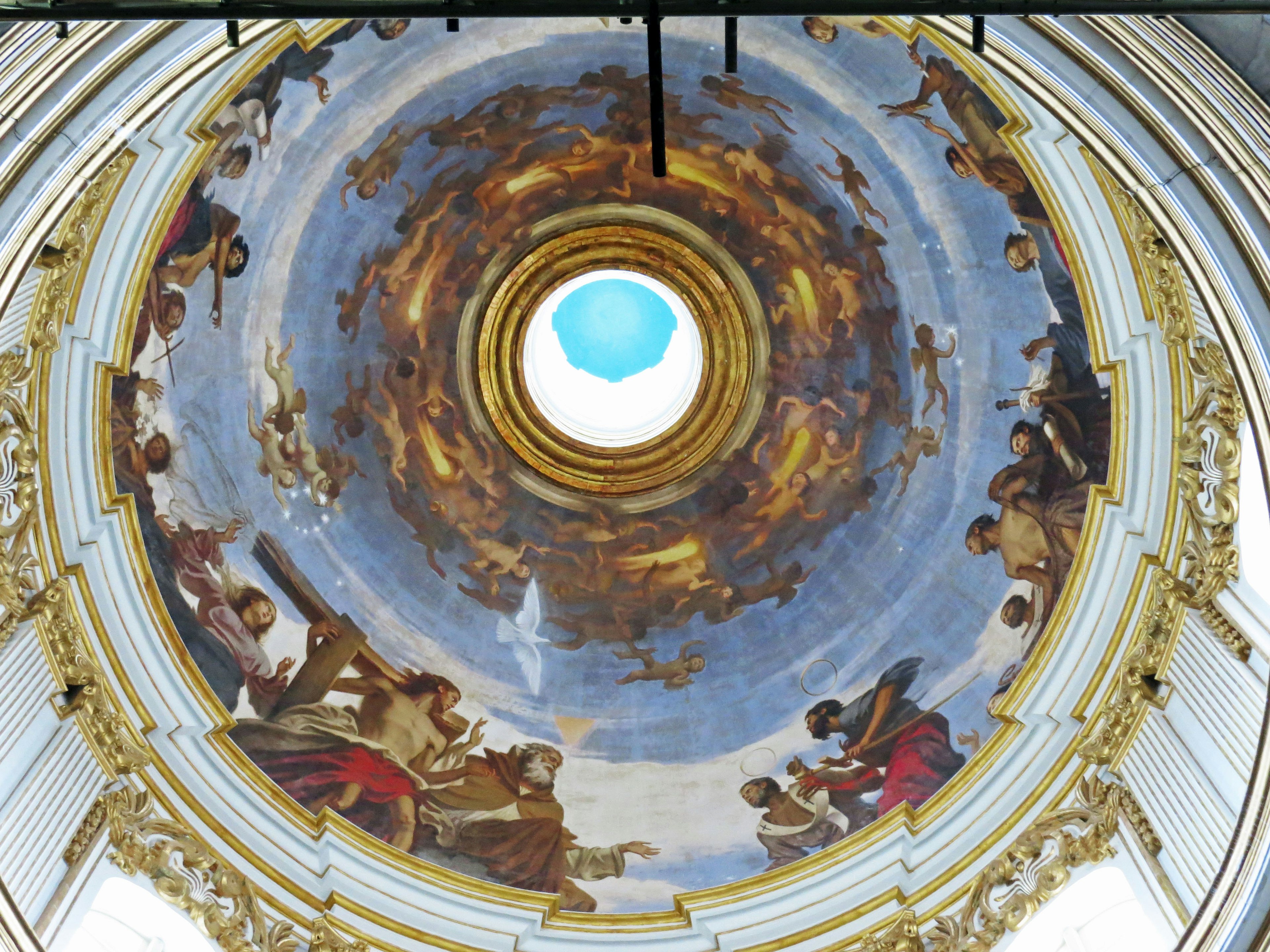 Cylindrical ceiling painting depicting mythological scenes with a blue skylight