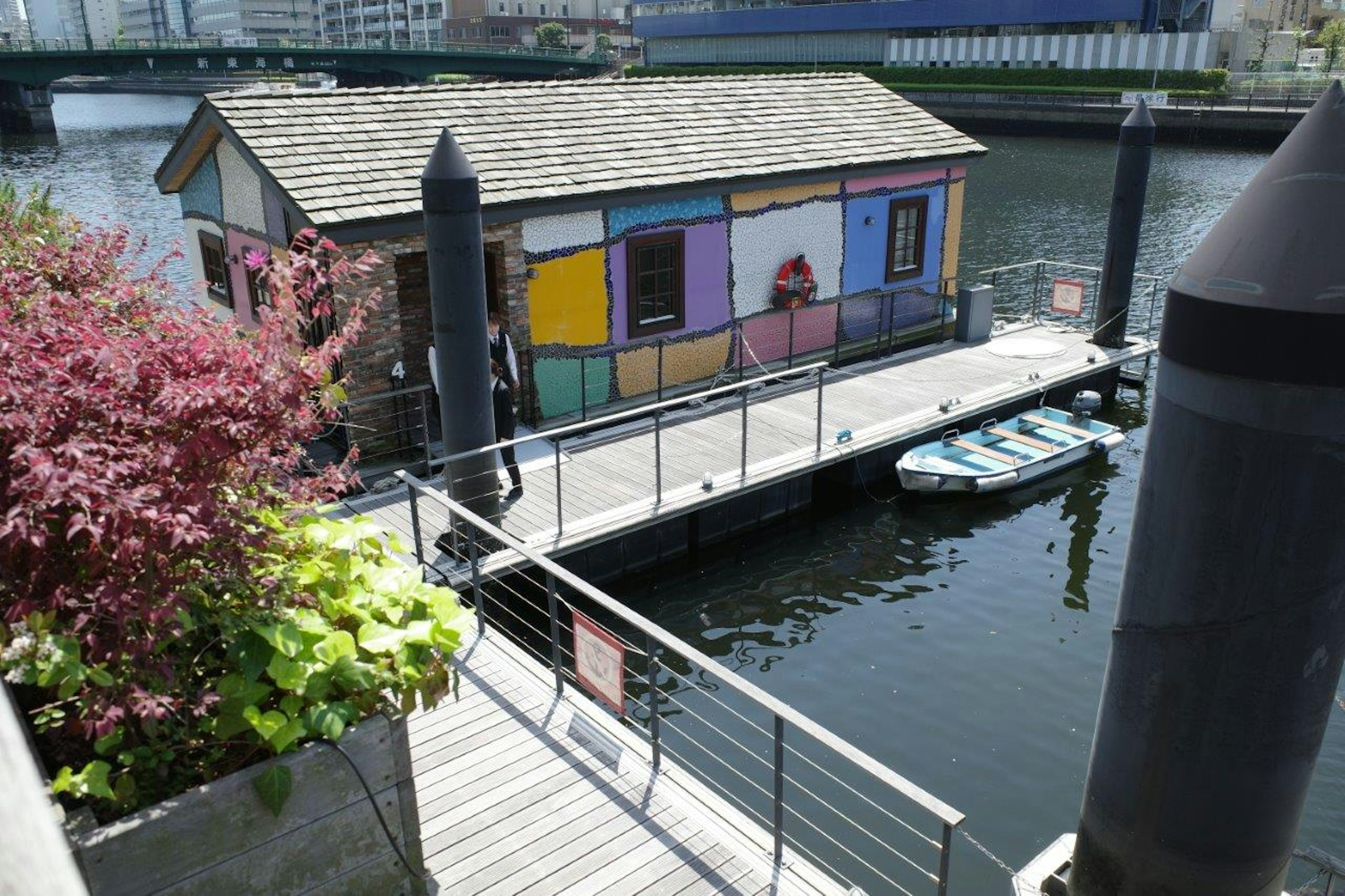 Colorful painted house on a dock by the water