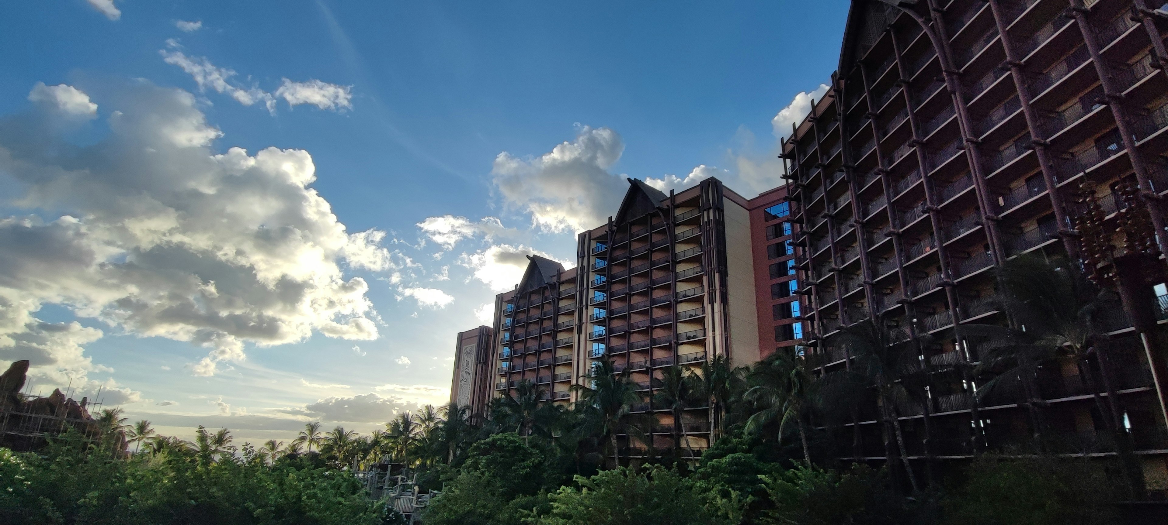 View of resort hotel with blue sky and clouds