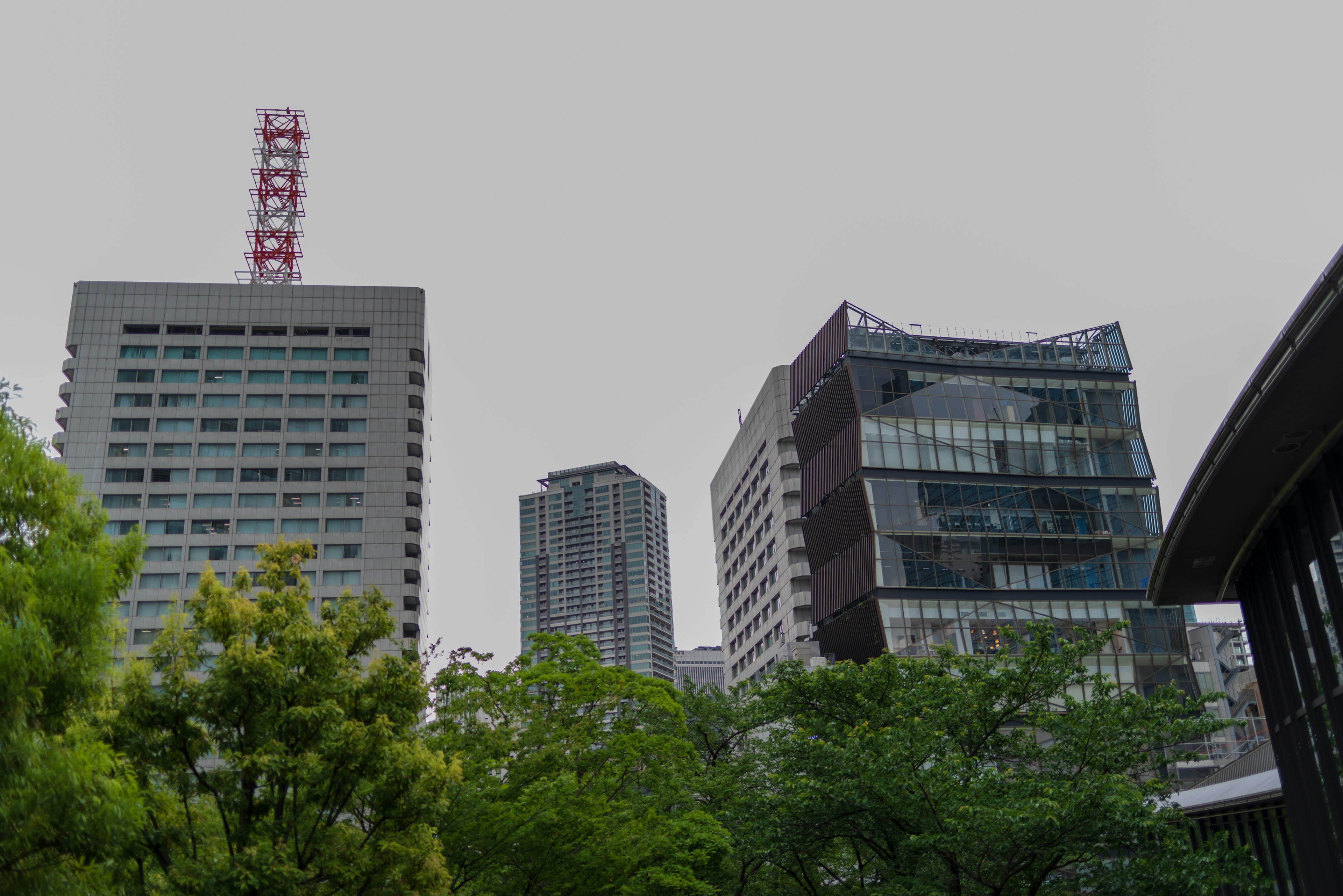 Urban landscape featuring skyscrapers and lush greenery