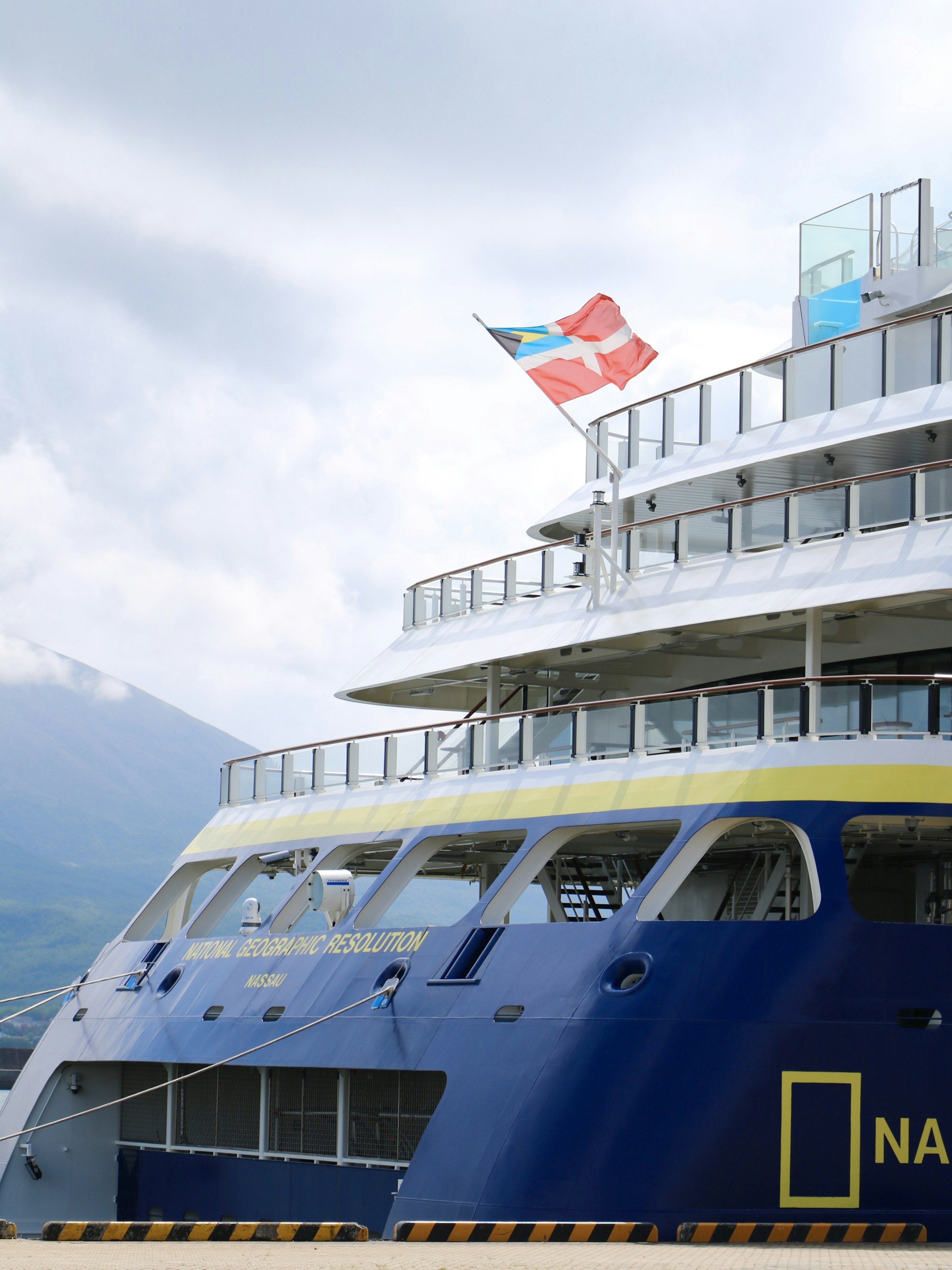 Image of a National Geographic ship with the Danish flag flying on the side