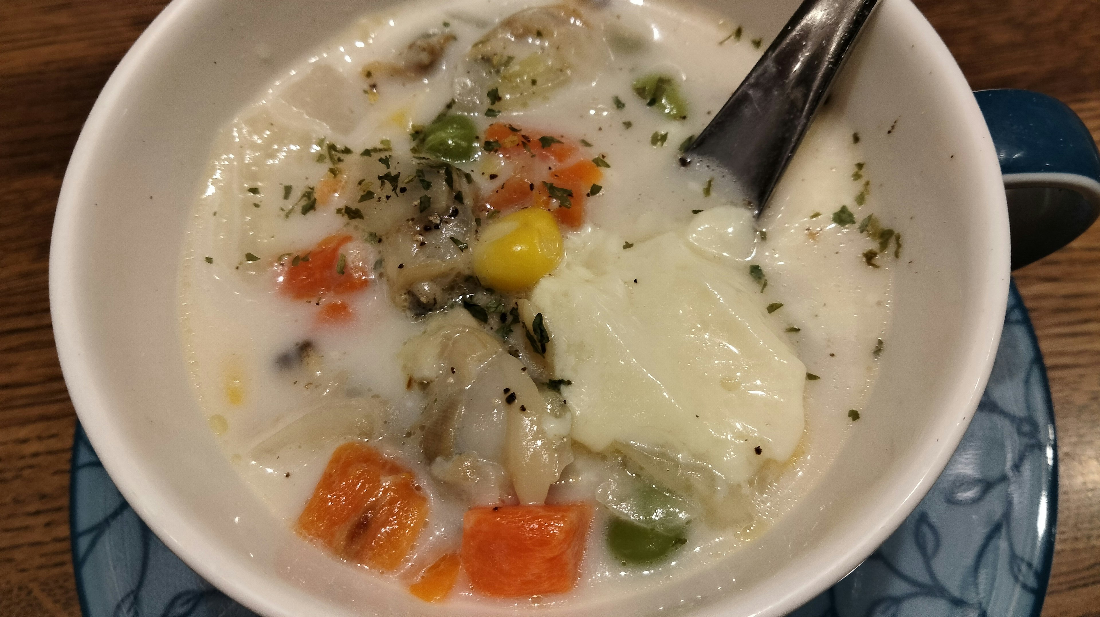 Creamy soup with vegetables and an egg