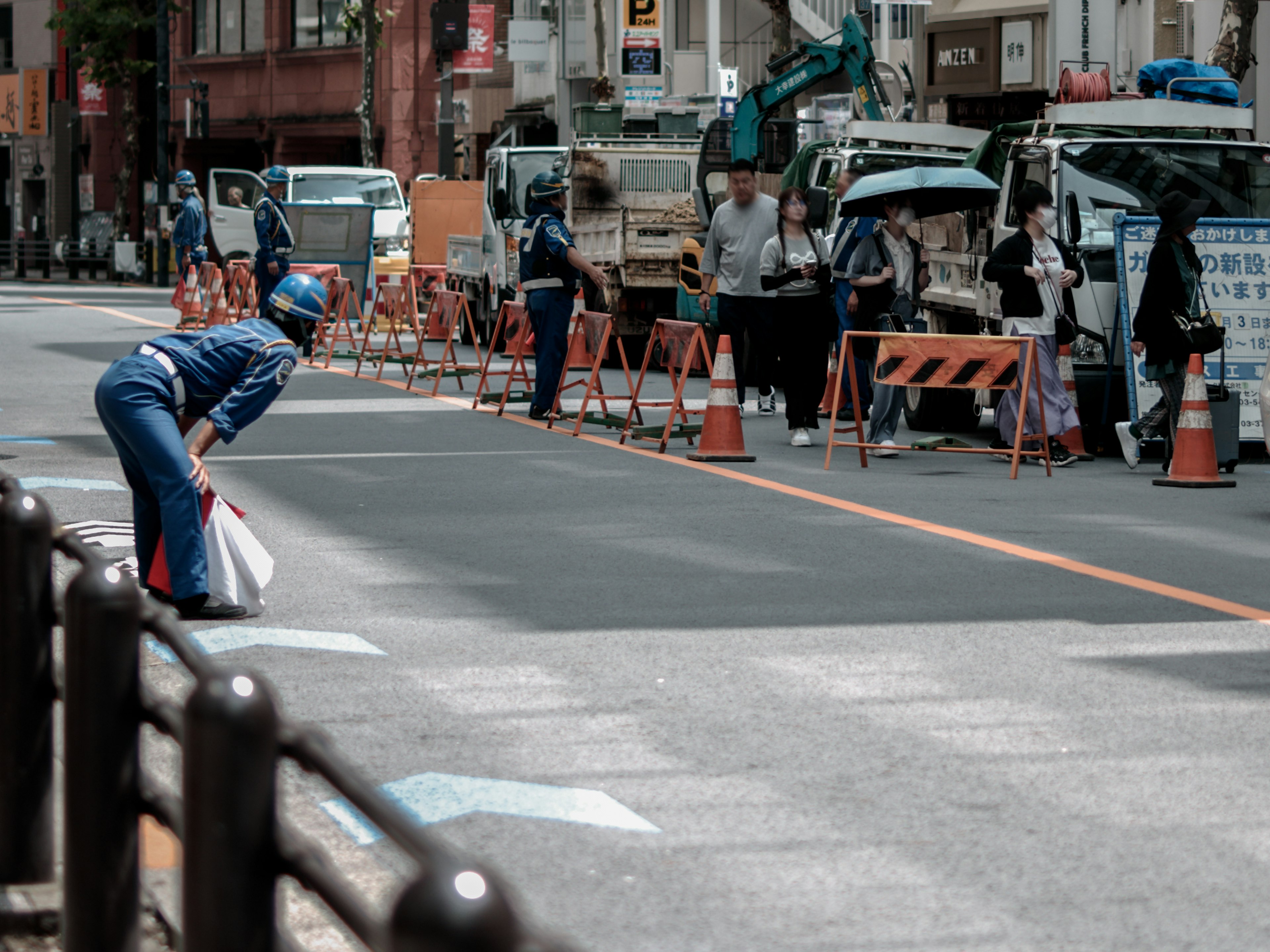 Street scene with a traffic officer directing traffic