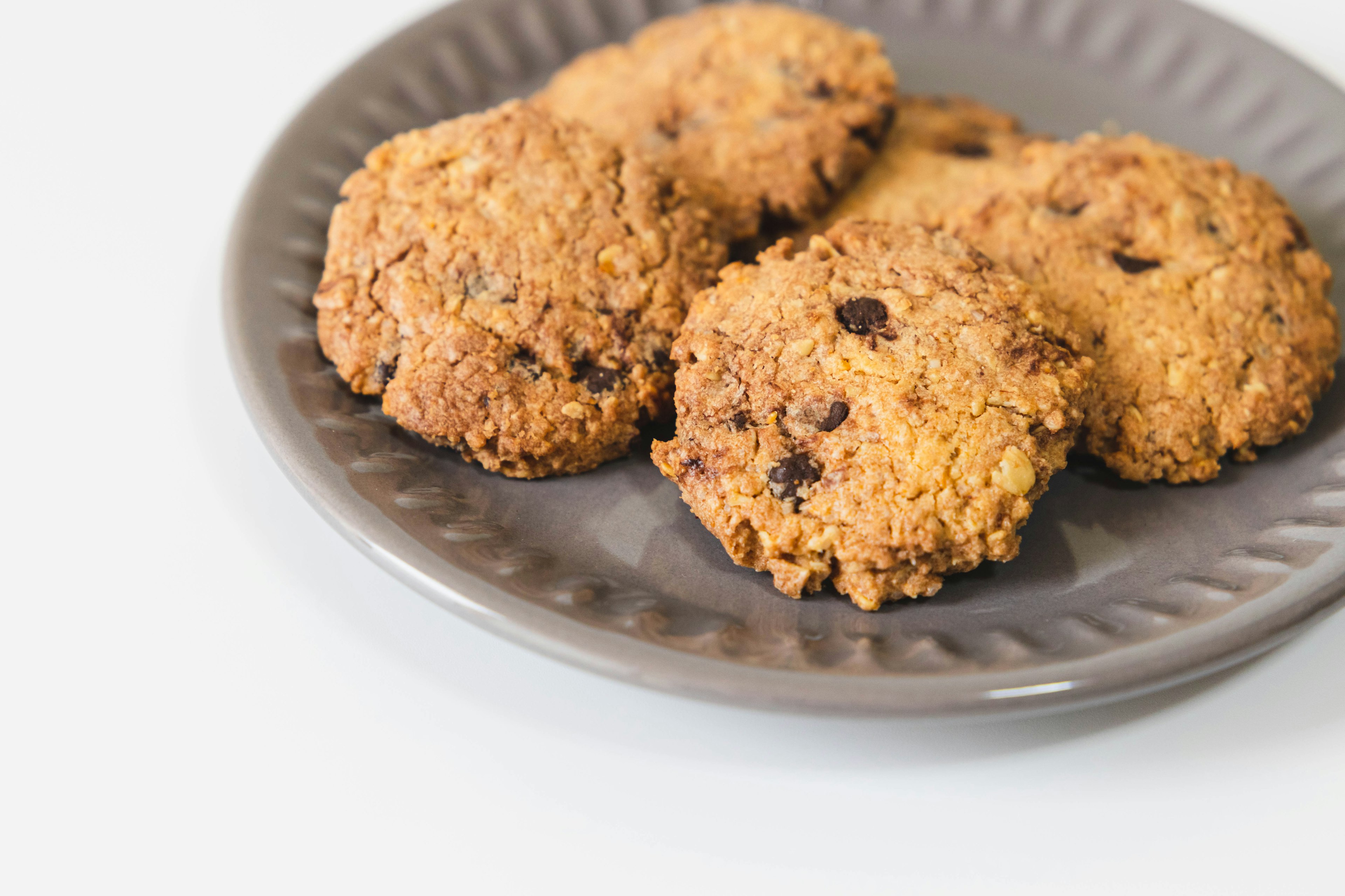 Baked cookies arranged on a gray plate