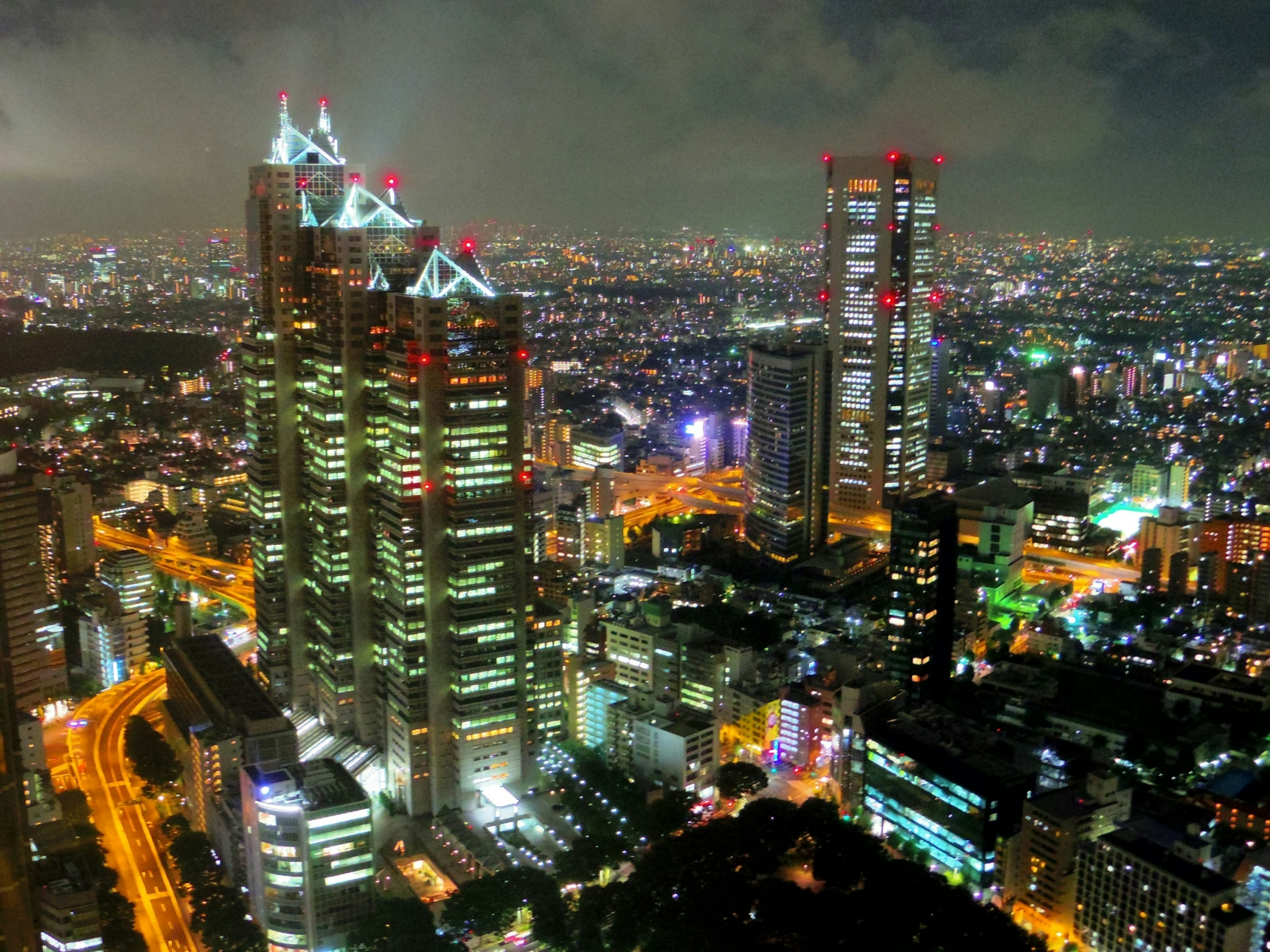 Night view of Tokyo skyscrapers with bright city lights