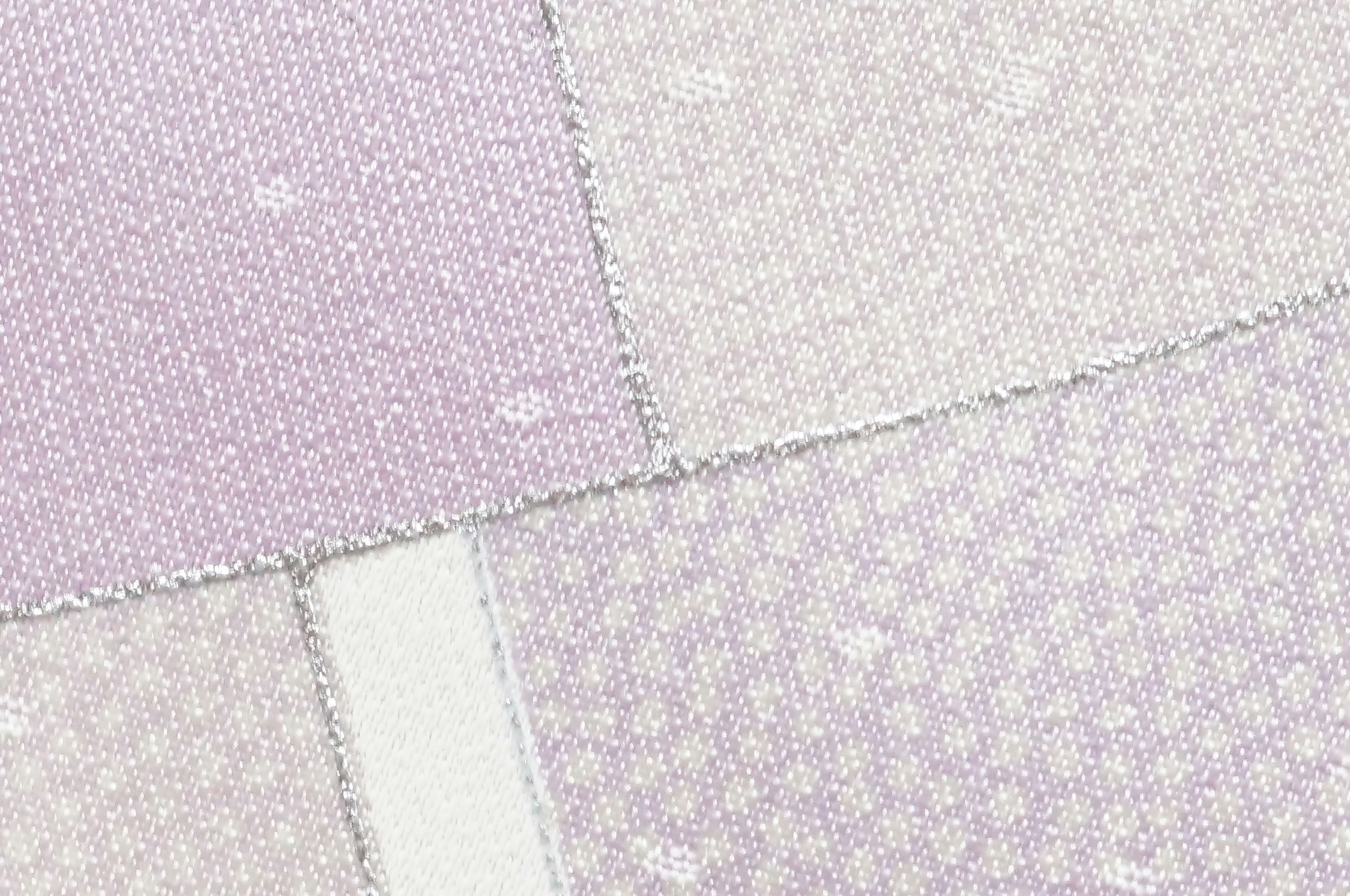 Texture et motifs de tissu patchwork violet clair