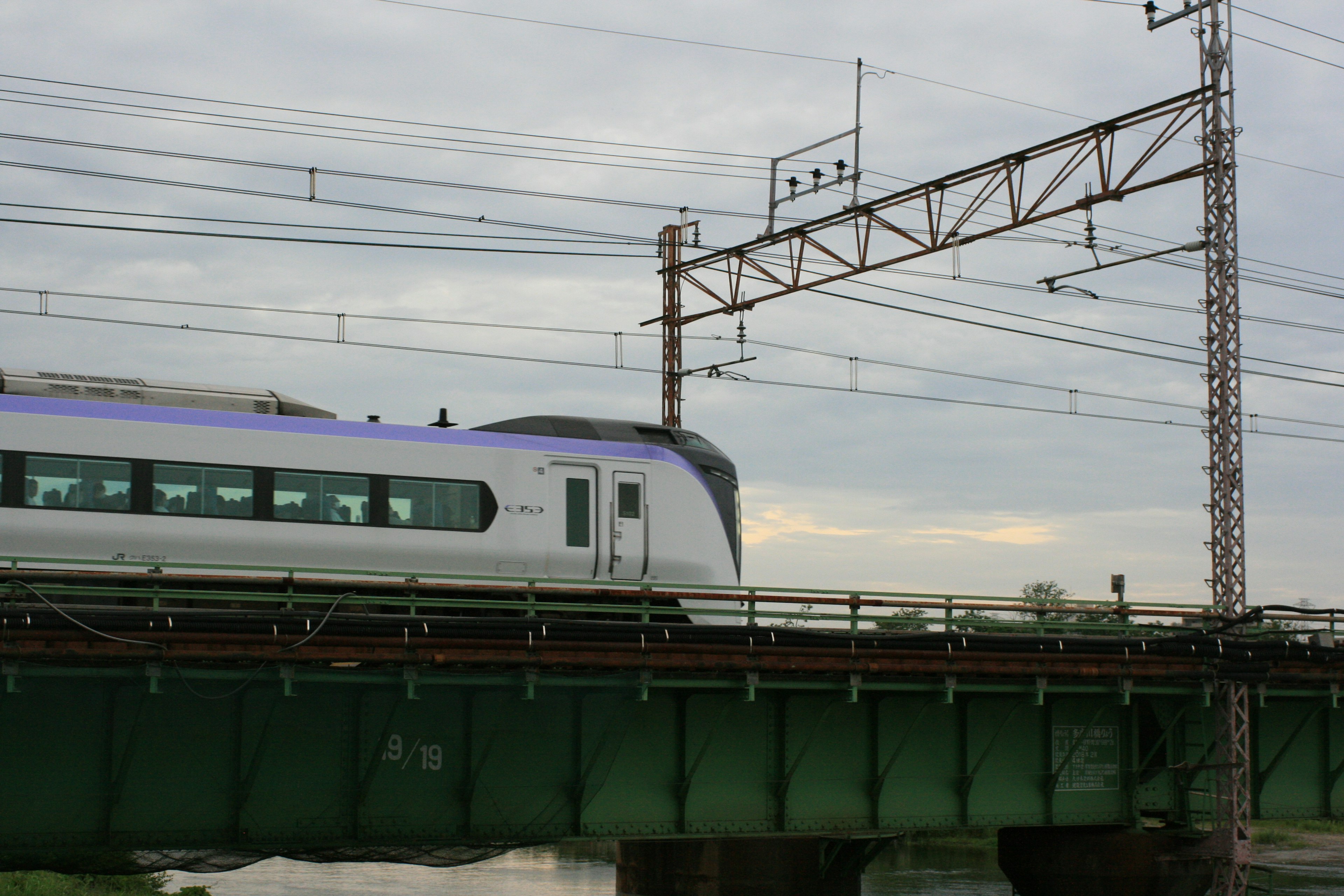 High-speed train crossing a bridge