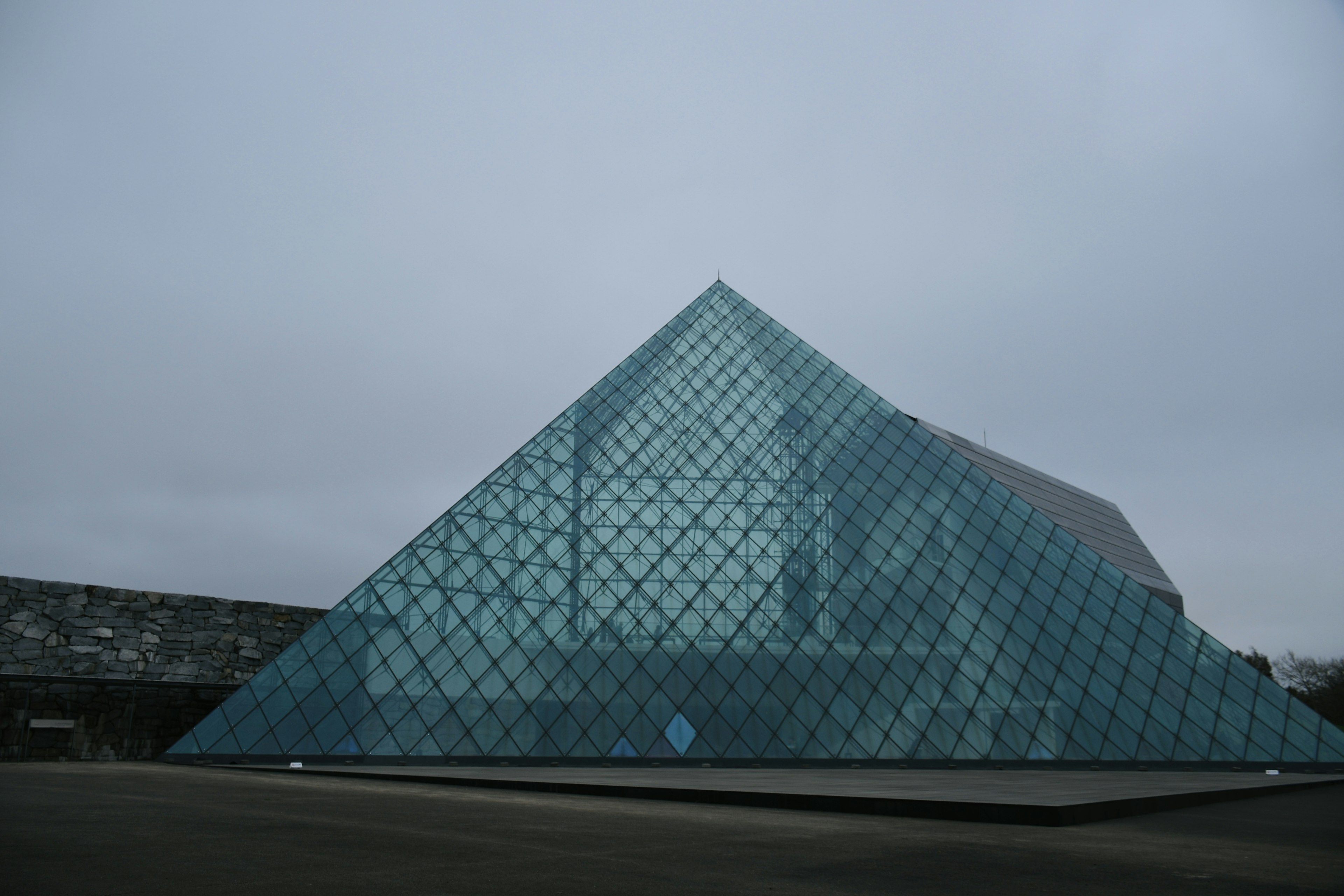 Exterior view of the glass pyramid at the Louvre Museum