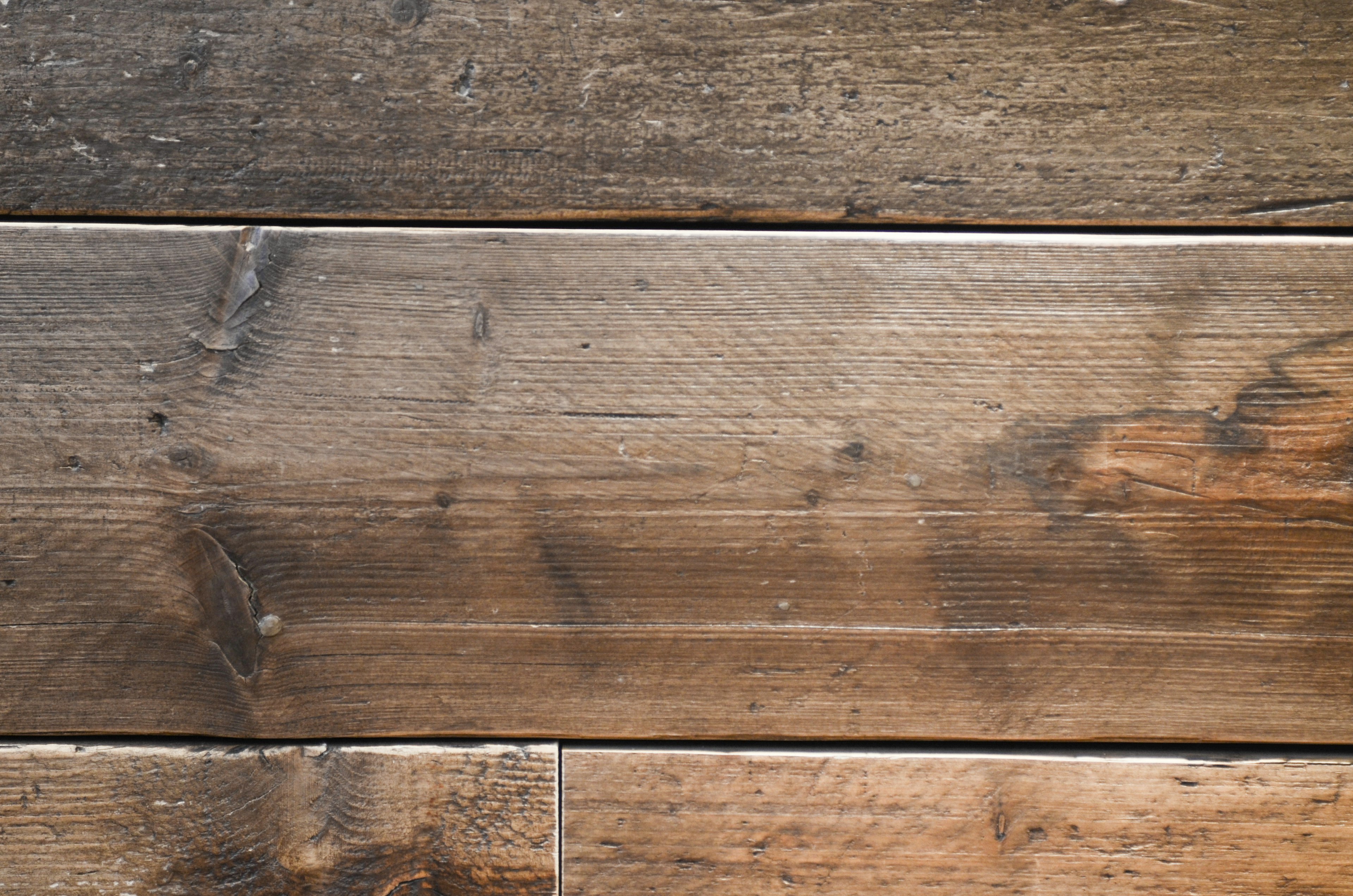 Textured wooden floor with varying shades and grains